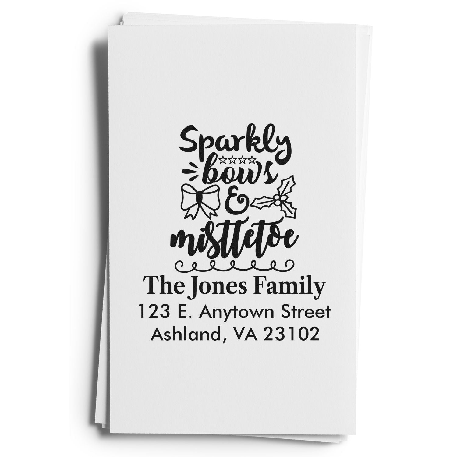 Personalized holiday return address rubber stamp with sparkly bows and mistletoe design for The Jones Family.