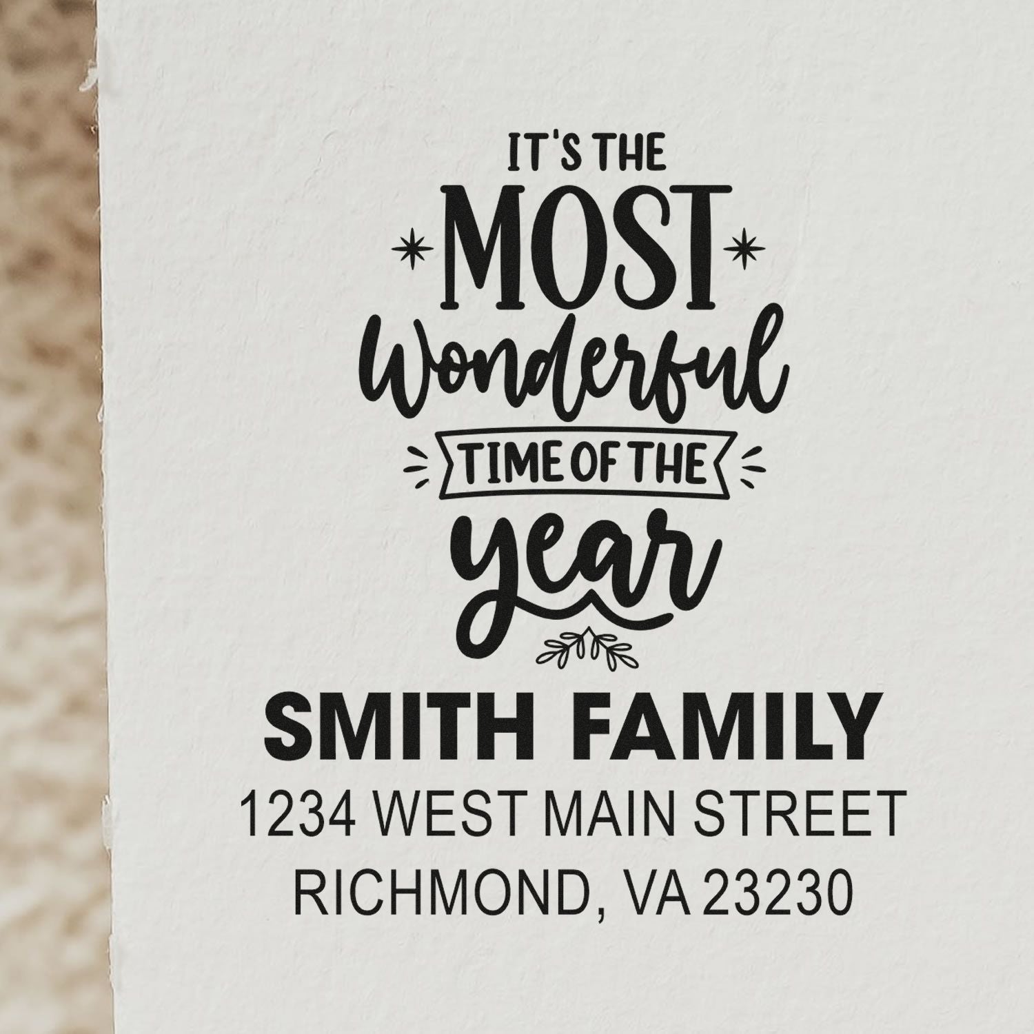 Custom holiday return address rubber stamp with Its the most wonderful time of the year for Smith family, Richmond, VA.