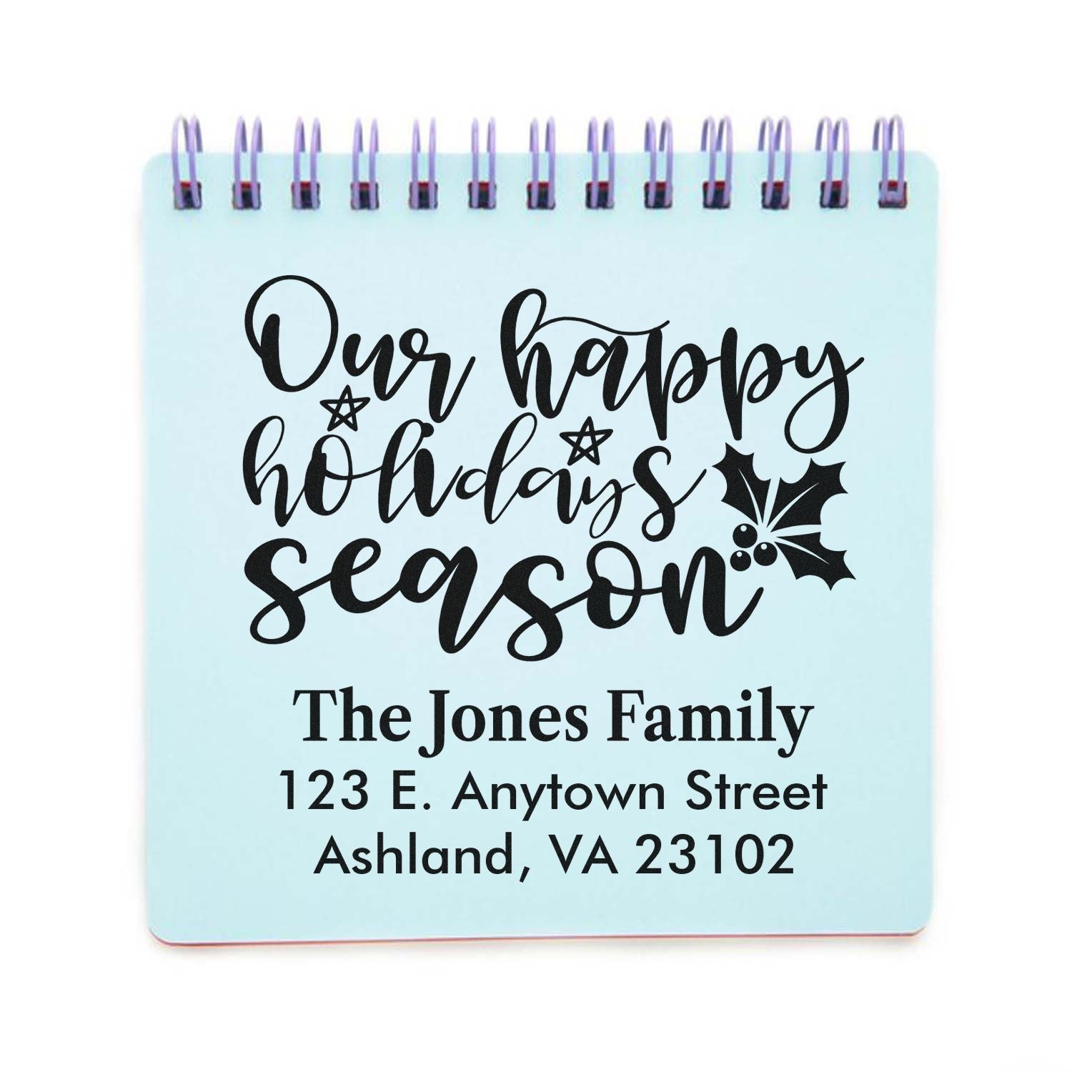 Personalized holiday return address rubber stamp with festive Our happy holidays season design and family address.
