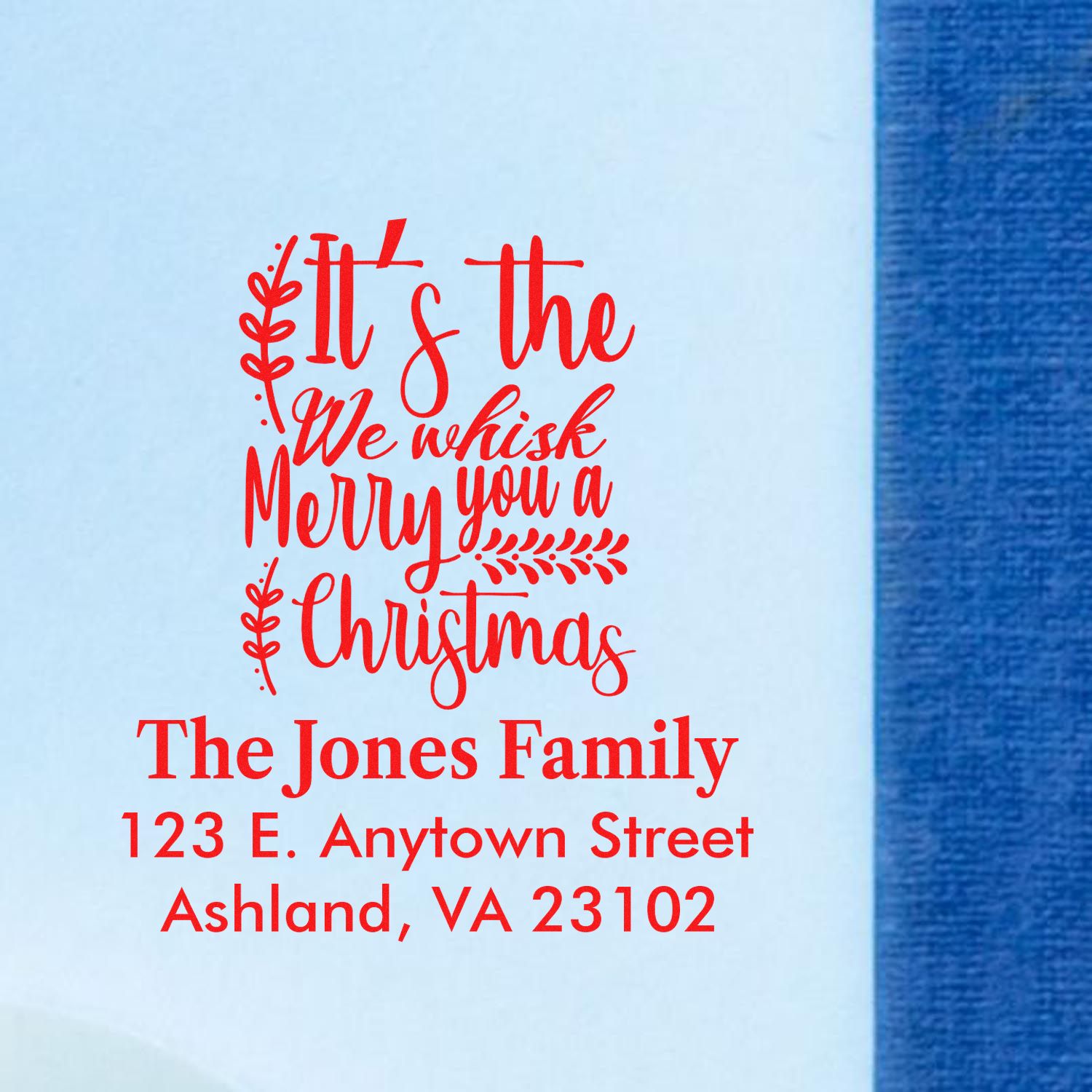 Custom Christmas rubber stamp with festive holiday greeting and return address for The Jones Family in Ashland, VA.