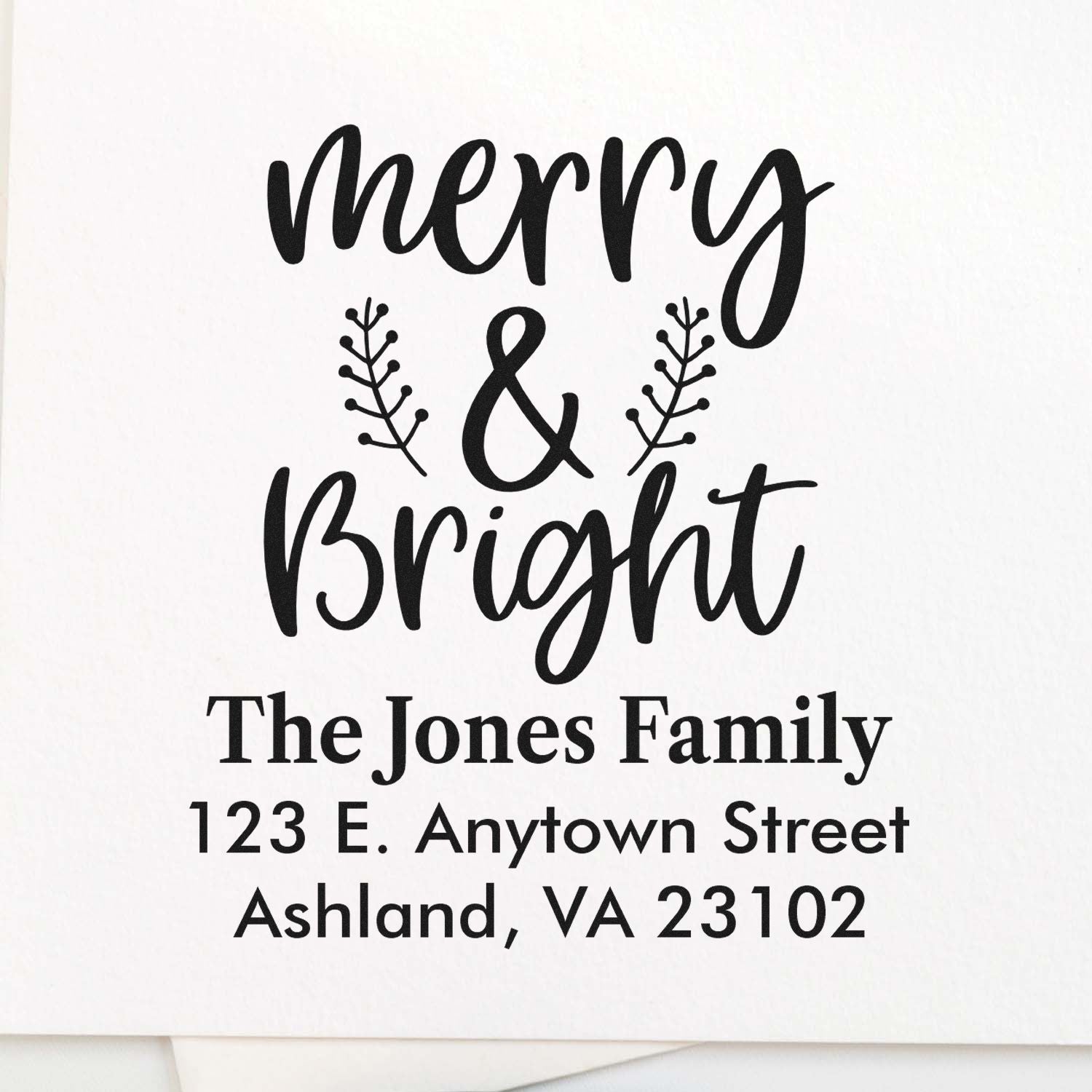 Custom Merry & Bright holiday address rubber stamp for The Jones Family with personalized mailing address.