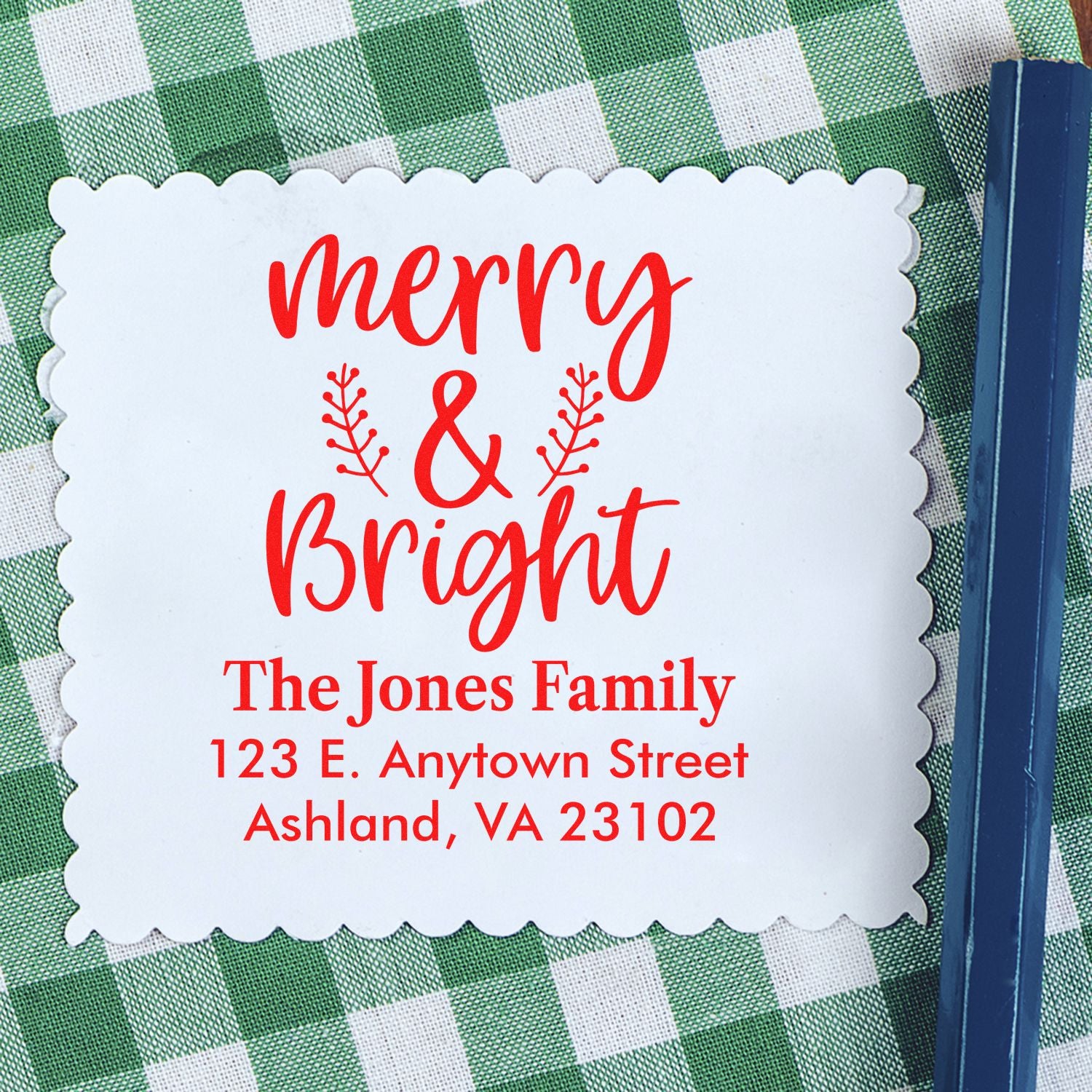 Custom Merry & Bright holiday return address rubber stamp featuring The Jones Family name and address.