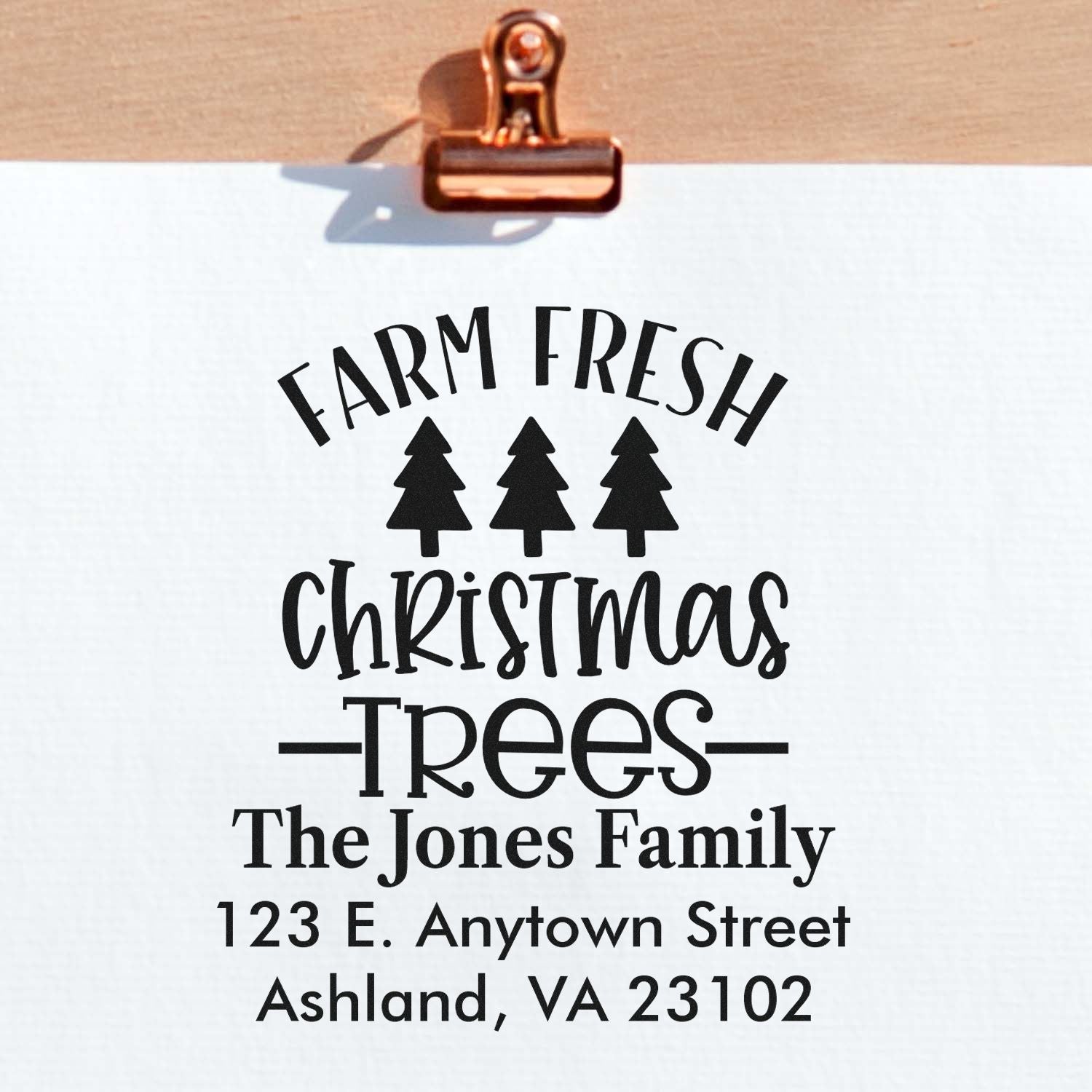 Personalized farm fresh Christmas trees rubber stamp for holiday packaging, featuring family name and address branding.