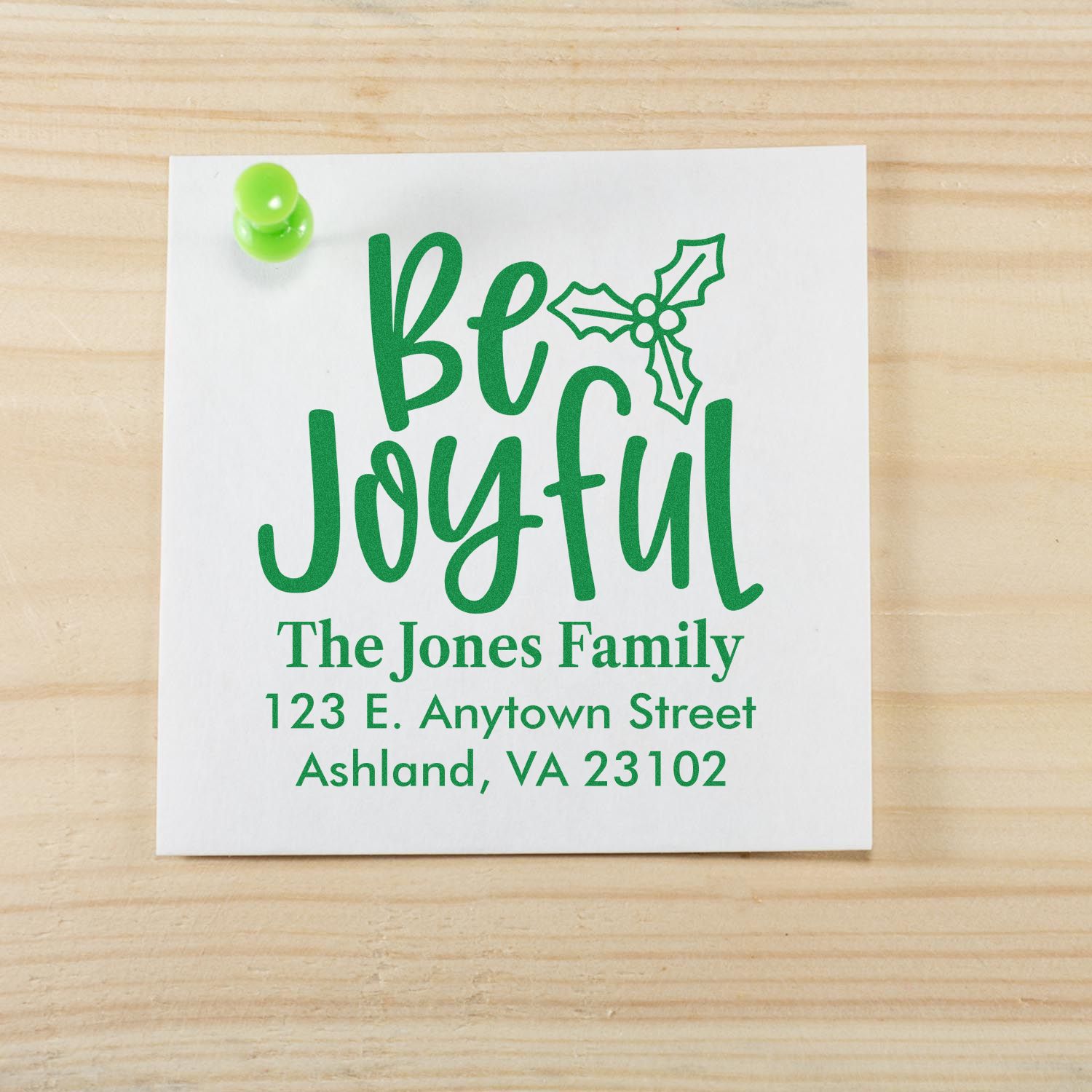 Personalized Christmas rubber stamp with Be Joyful holly design and return address for holiday cards.