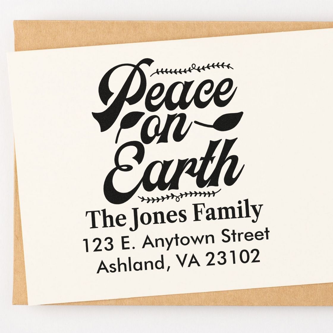 Personalized return address rubber stamp with Peace on Earth holiday design for The Jones Family.