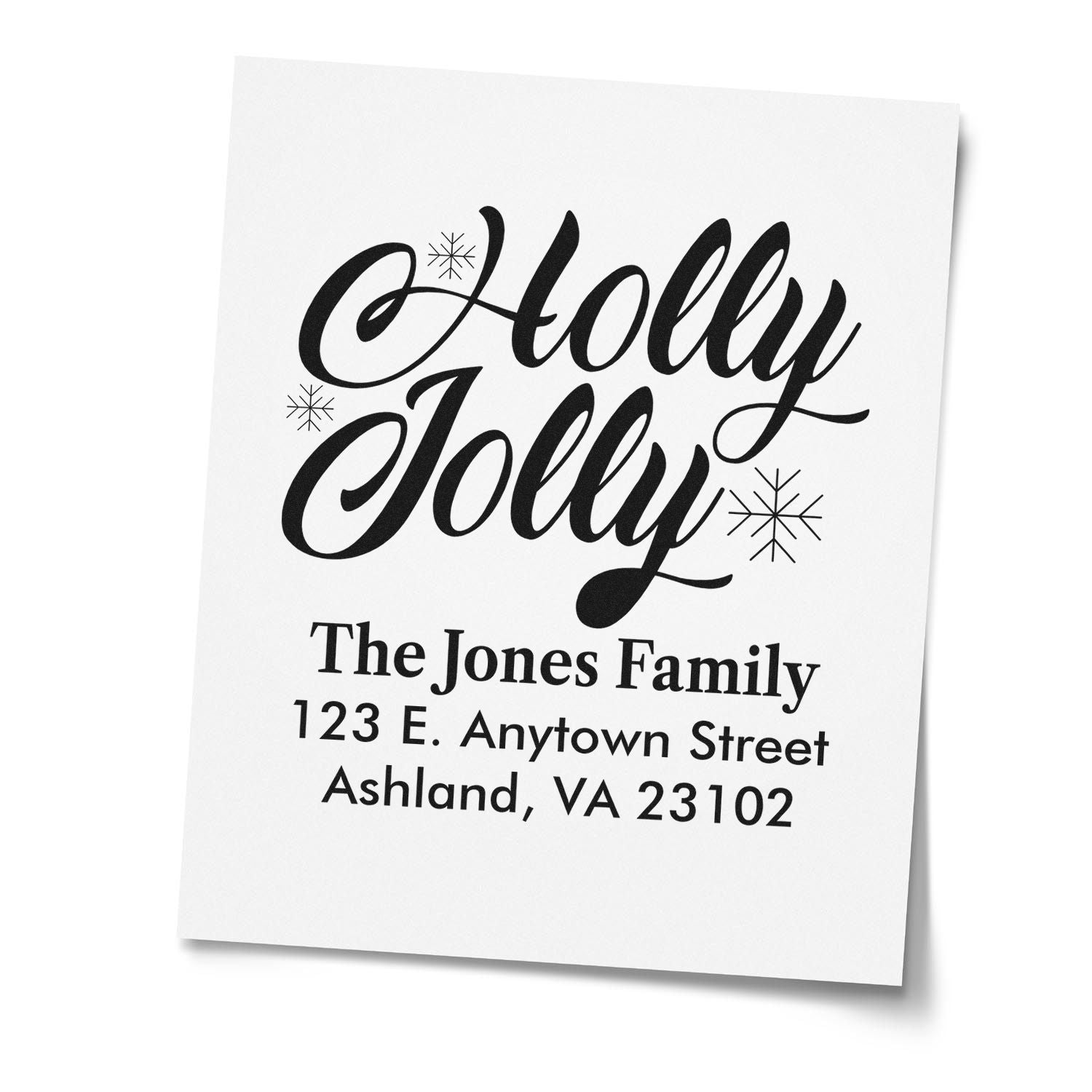 Custom Holly Jolly holiday return address rubber stamp for The Jones Family, with snowflakes and Ashland, VA address.