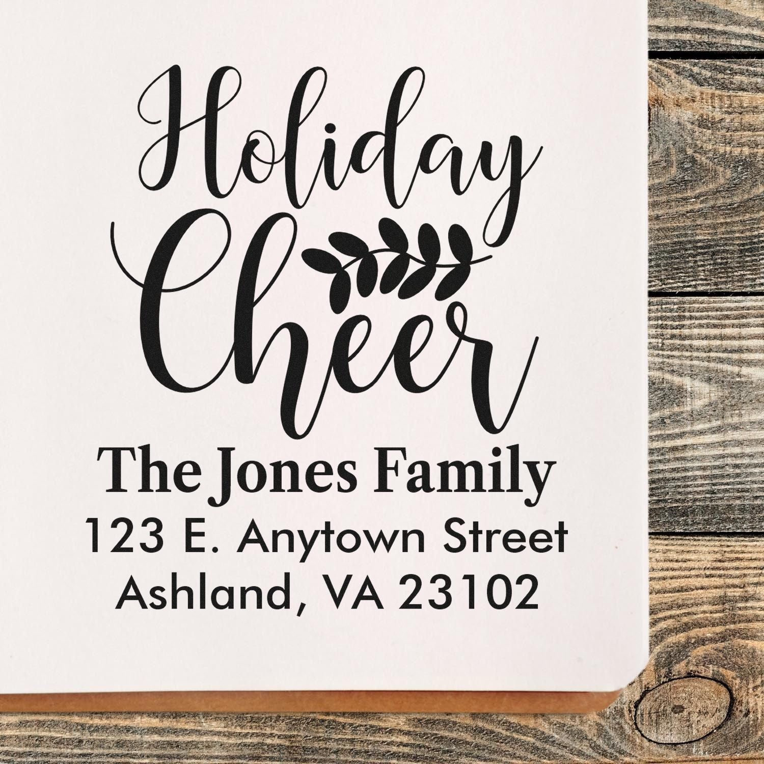 Personalized Holiday Cheer rubber stamp with family name and return address for festive holiday cards.