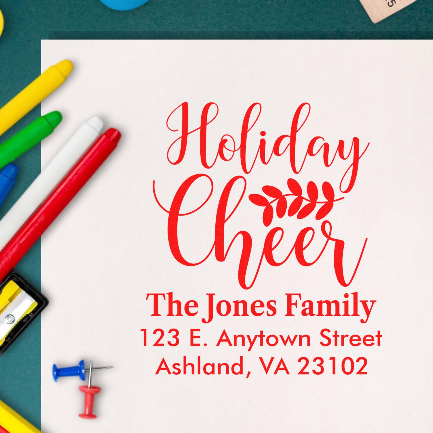 Custom Holiday Cheer rubber stamp with family name and address for festive holiday cards and envelopes.