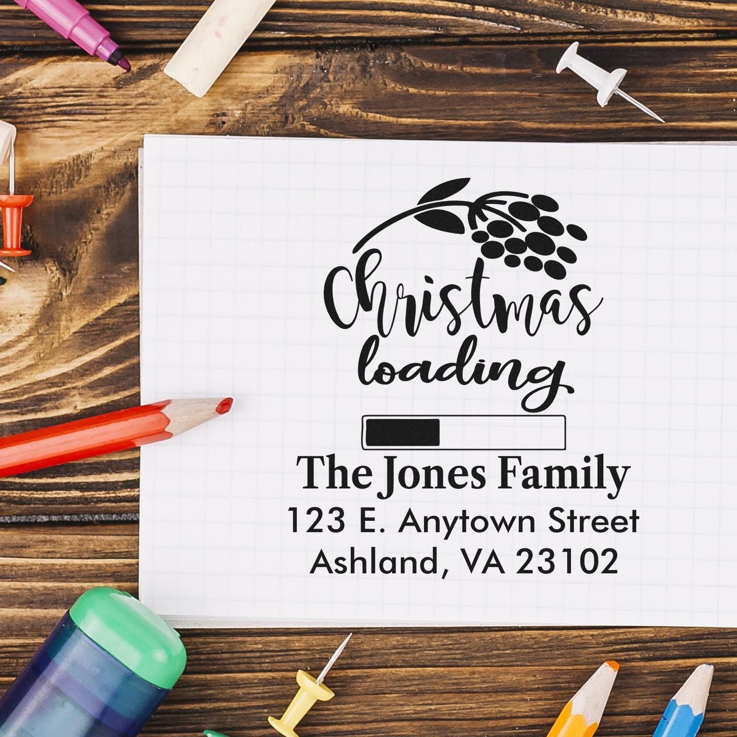 Personalized Christmas loading return address rubber stamp for holiday cards, featuring family name and mailing address.