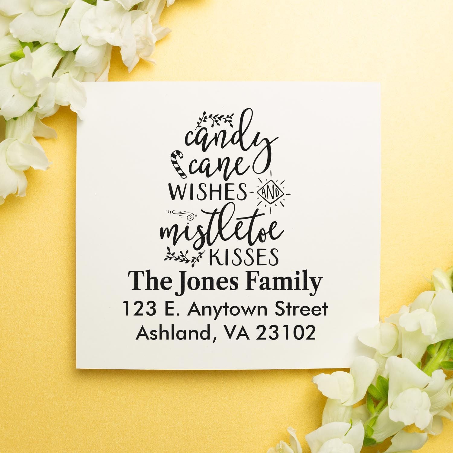 Personalized Christmas rubber stamp with Candy Cane Wishes and Mistletoe Kisses and family return address.