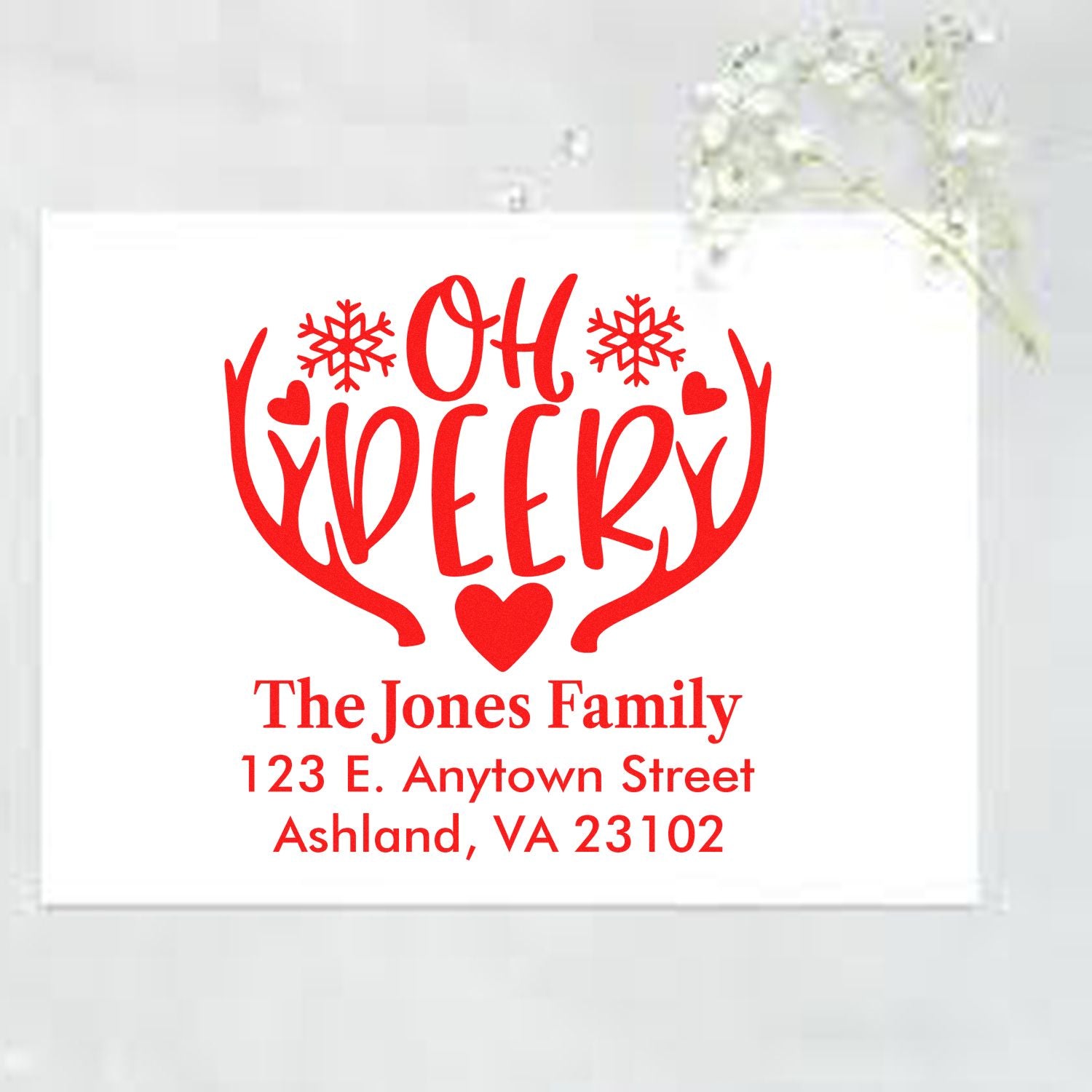 Custom Christmas rubber stamp with Oh Deer reindeer design, family name, and return address for holiday cards.