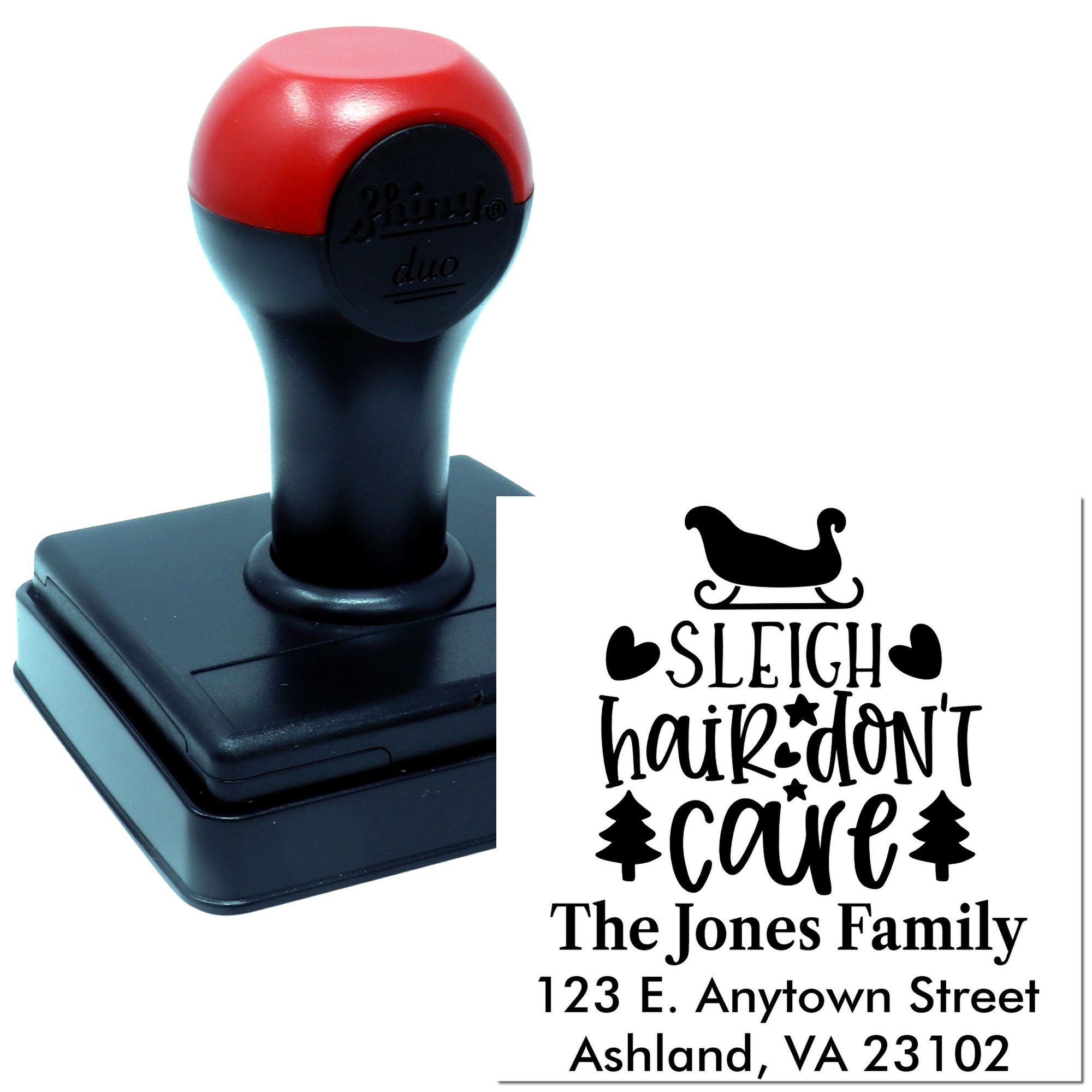 Custom self-inking rubber stamp with festive sleigh design, family name, and return address for holiday mail.