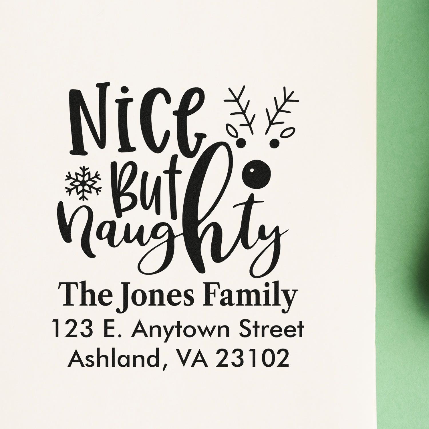 Custom Christmas rubber stamp with Nice but naughty design and personalized family address for holiday cards