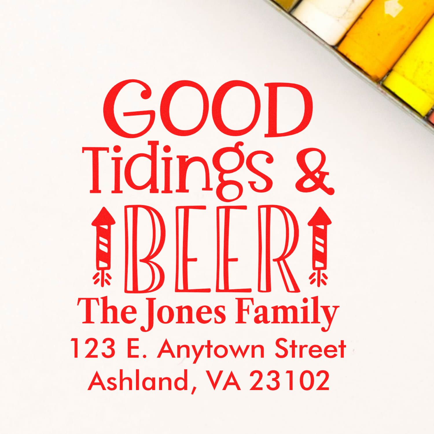 Personalized holiday rubber stamp with Good Tidings & Beer and The Jones Family return address.