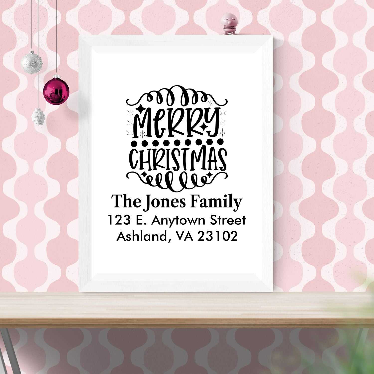 Personalized Merry Christmas return address stamp design for The Jones Family, with custom name and mailing address.