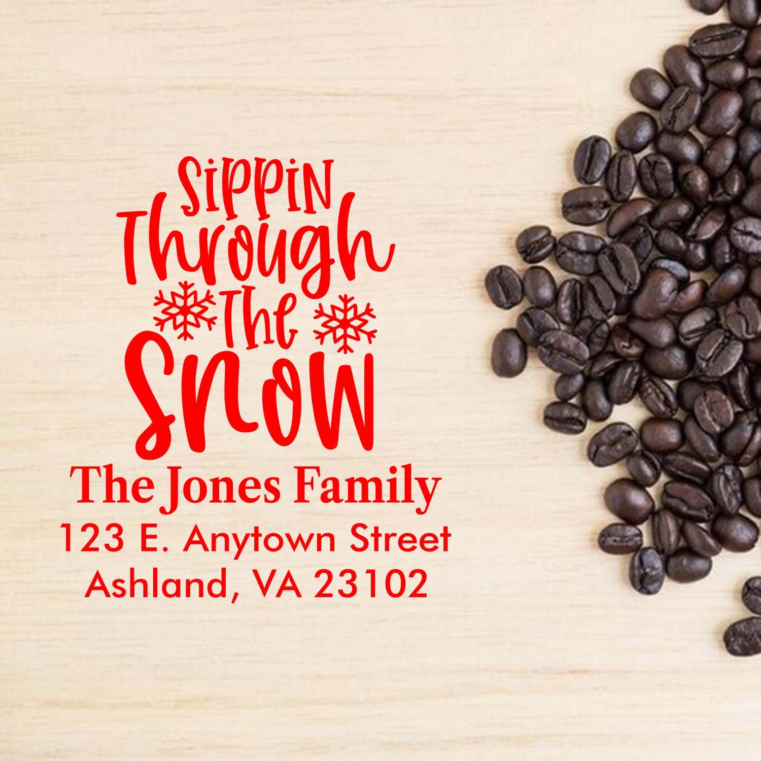 Personalized holiday rubber stamp with coffee theme, Sippin Through the Snow, family name, and return address.
