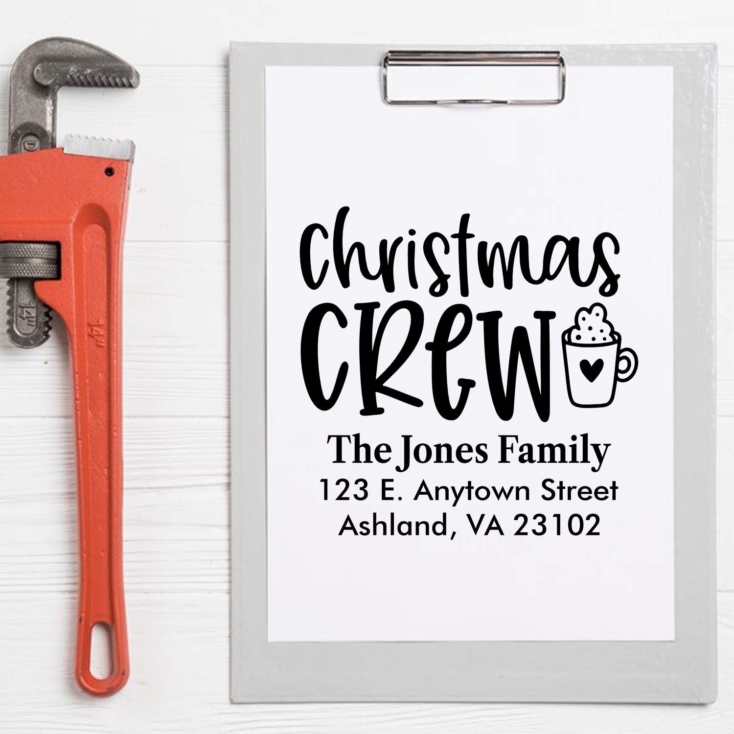Custom Christmas Crew return address rubber stamp for holiday cards, featuring personalized family name and address.