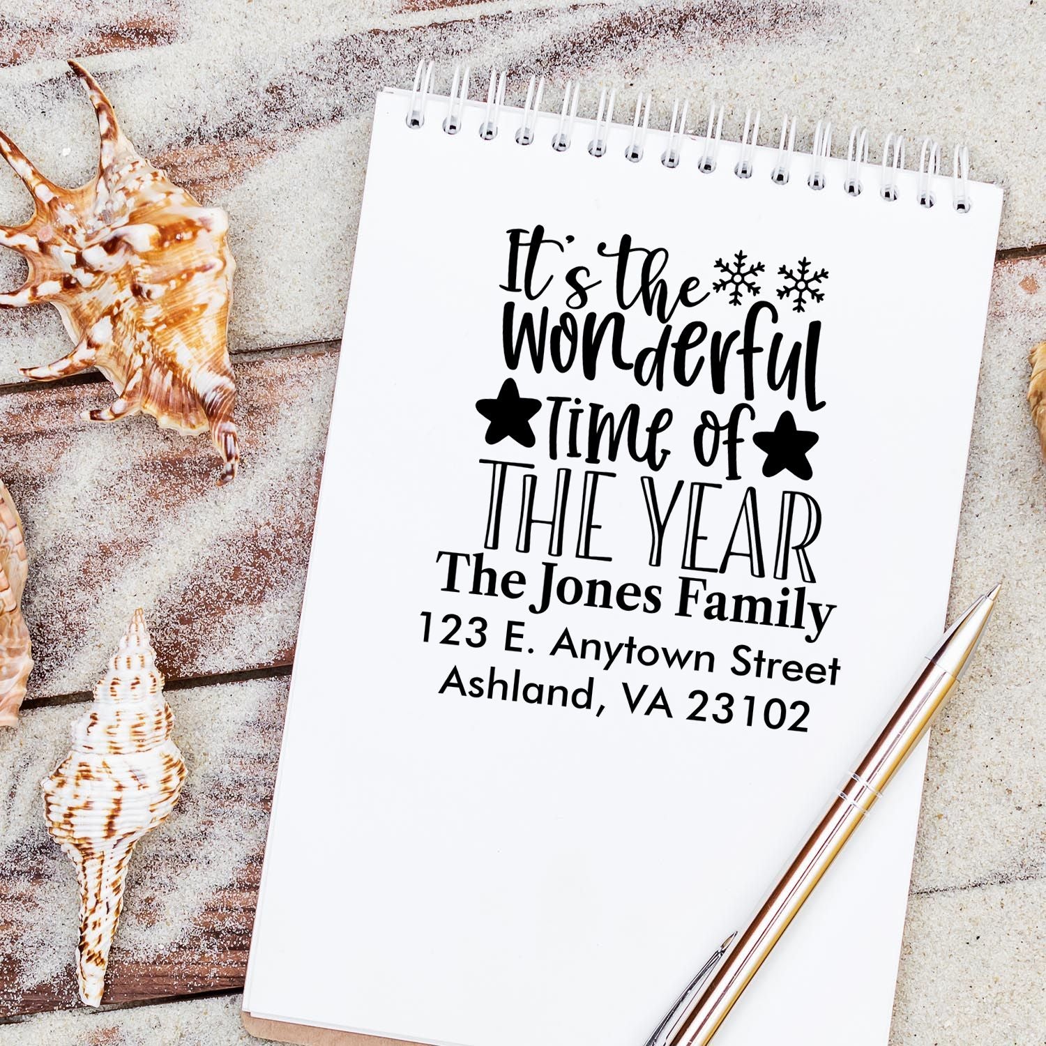 Custom holiday return address rubber stamp with Its the wonderful time of the year, family name, address, and snowflakes.