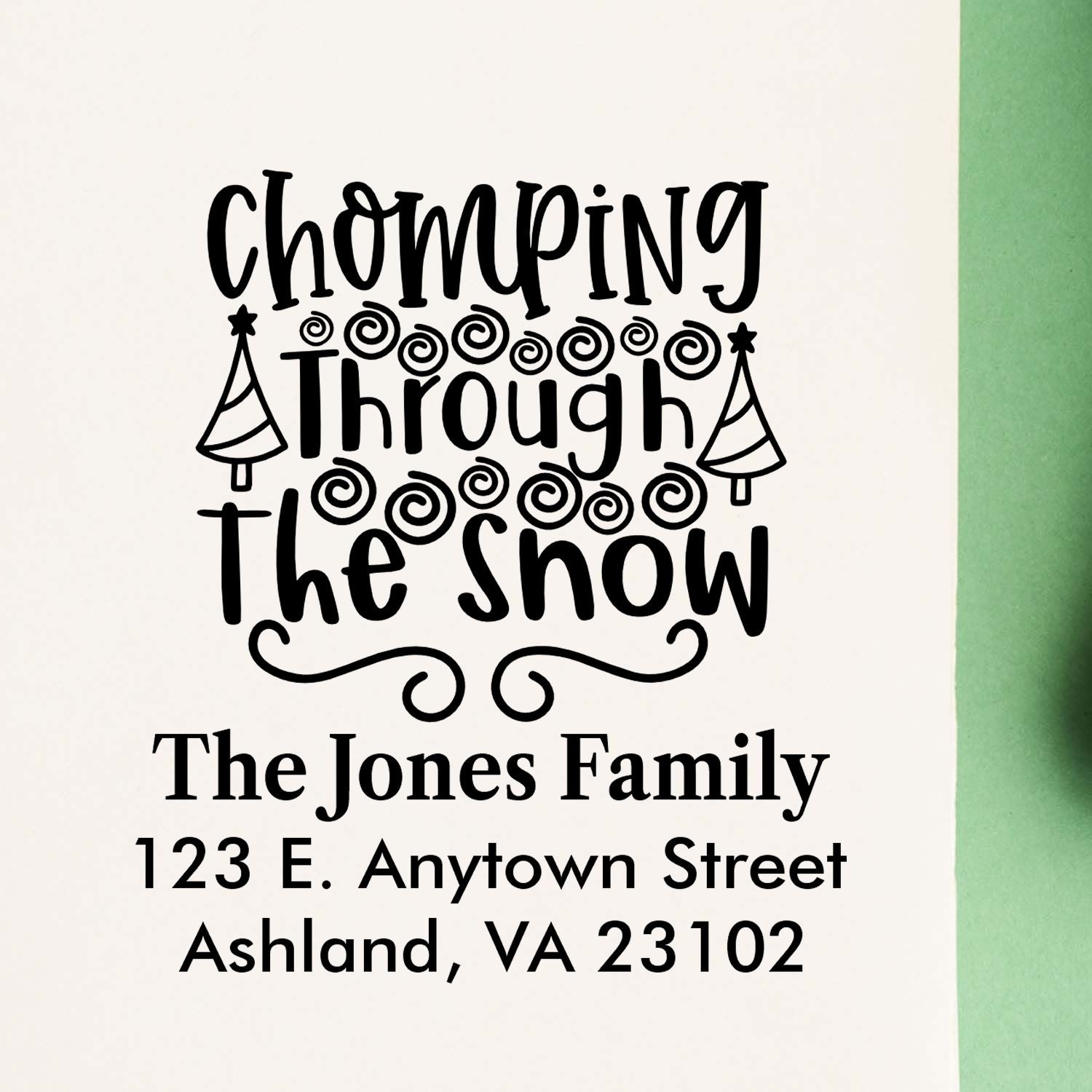 Custom Christmas return address stamp for The Jones Family featuring Chomping Through the Snow festive holiday design.