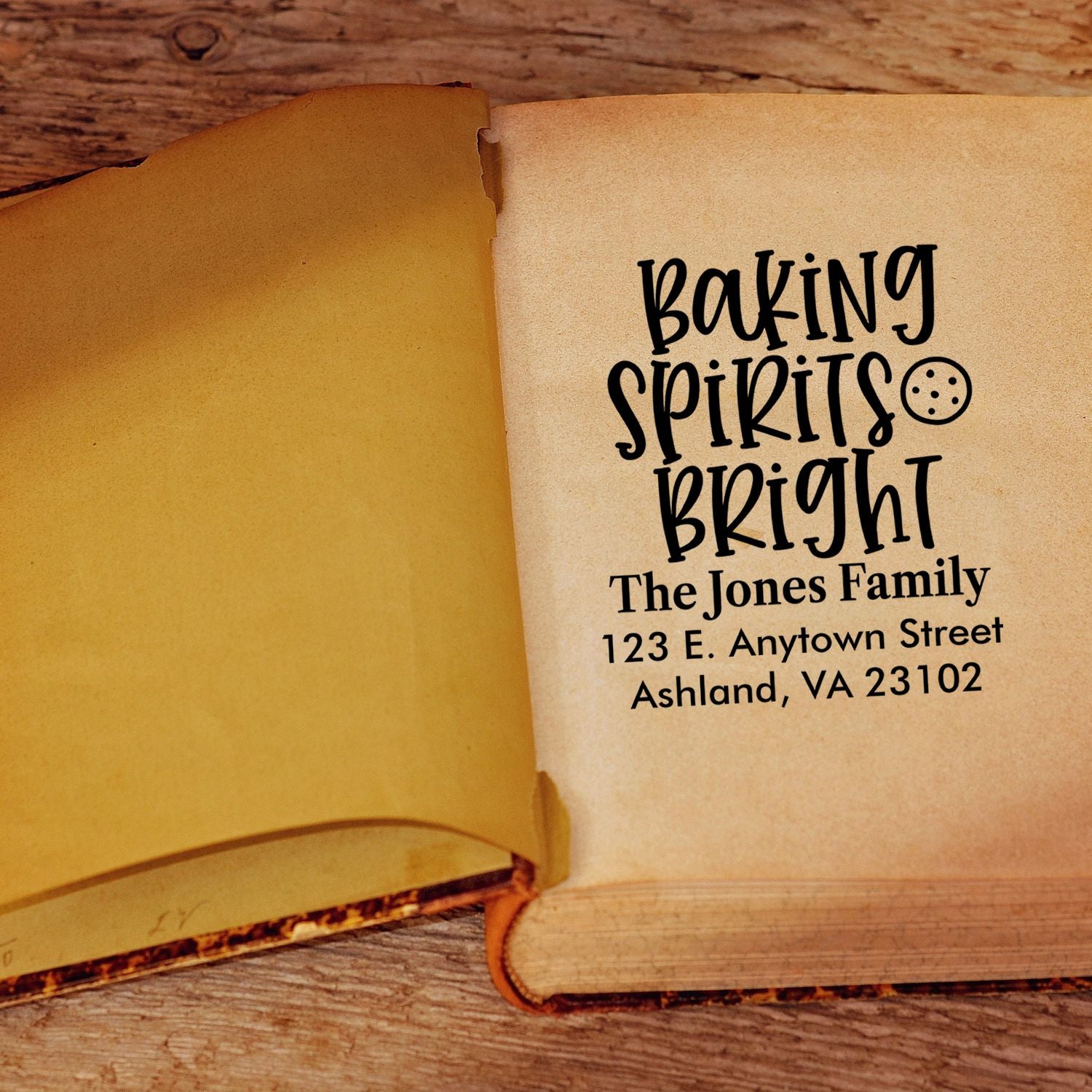 Custom rubber stamp design reading Baking Spirits Bright with family return address for holiday baking and cards.