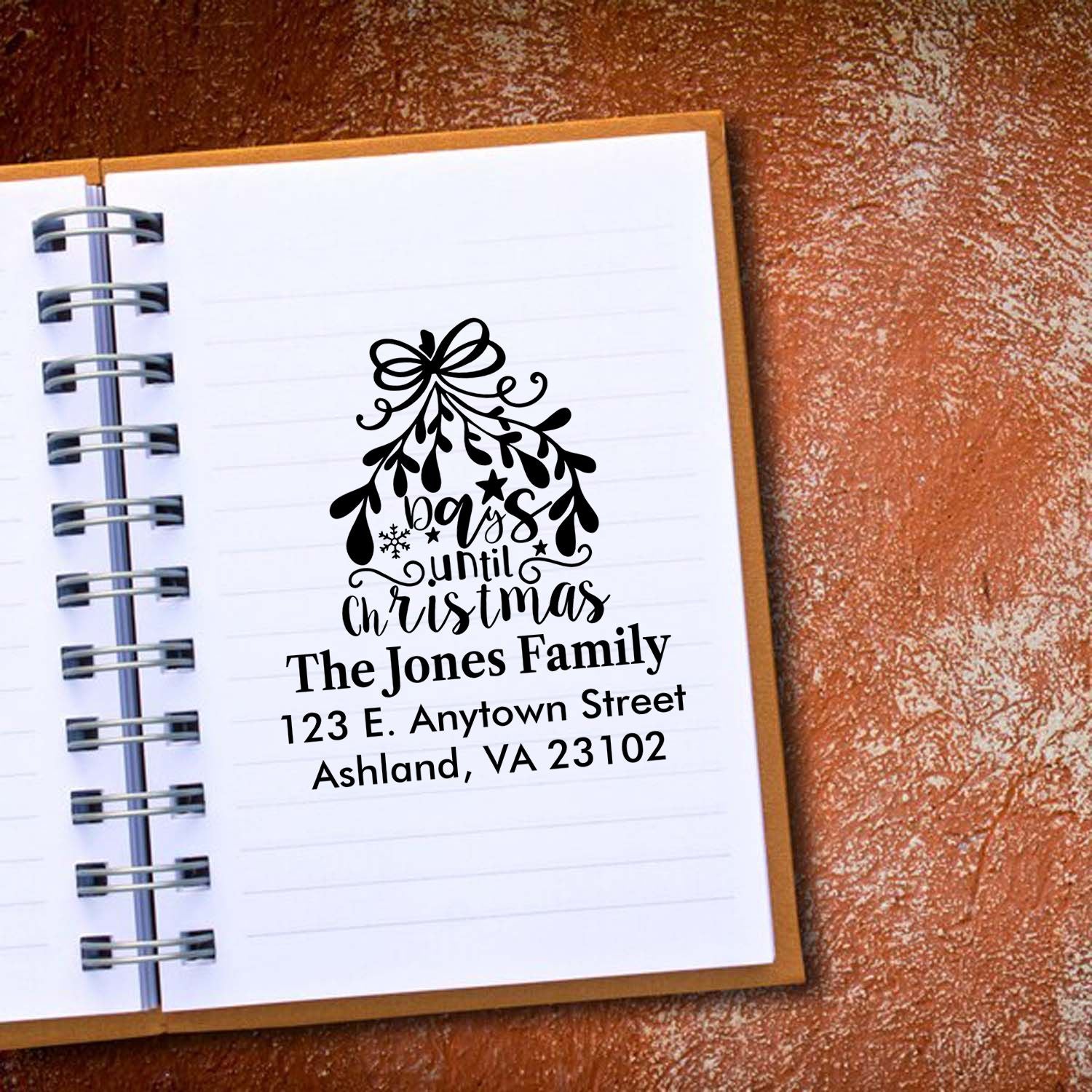 Personalized Christmas rubber stamp with tree design and return address for The Jones Family, Ashland VA.