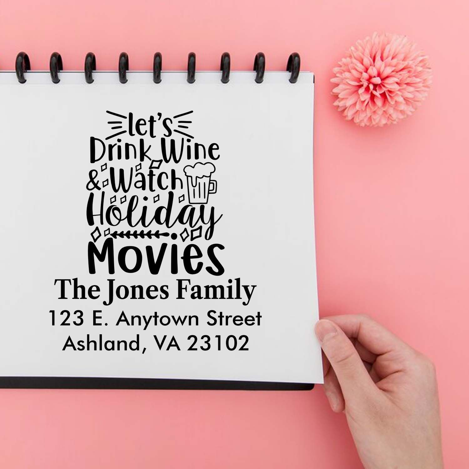 Custom holiday movie rubber stamp with personalized family name and address, perfect for festive cards and invitations.