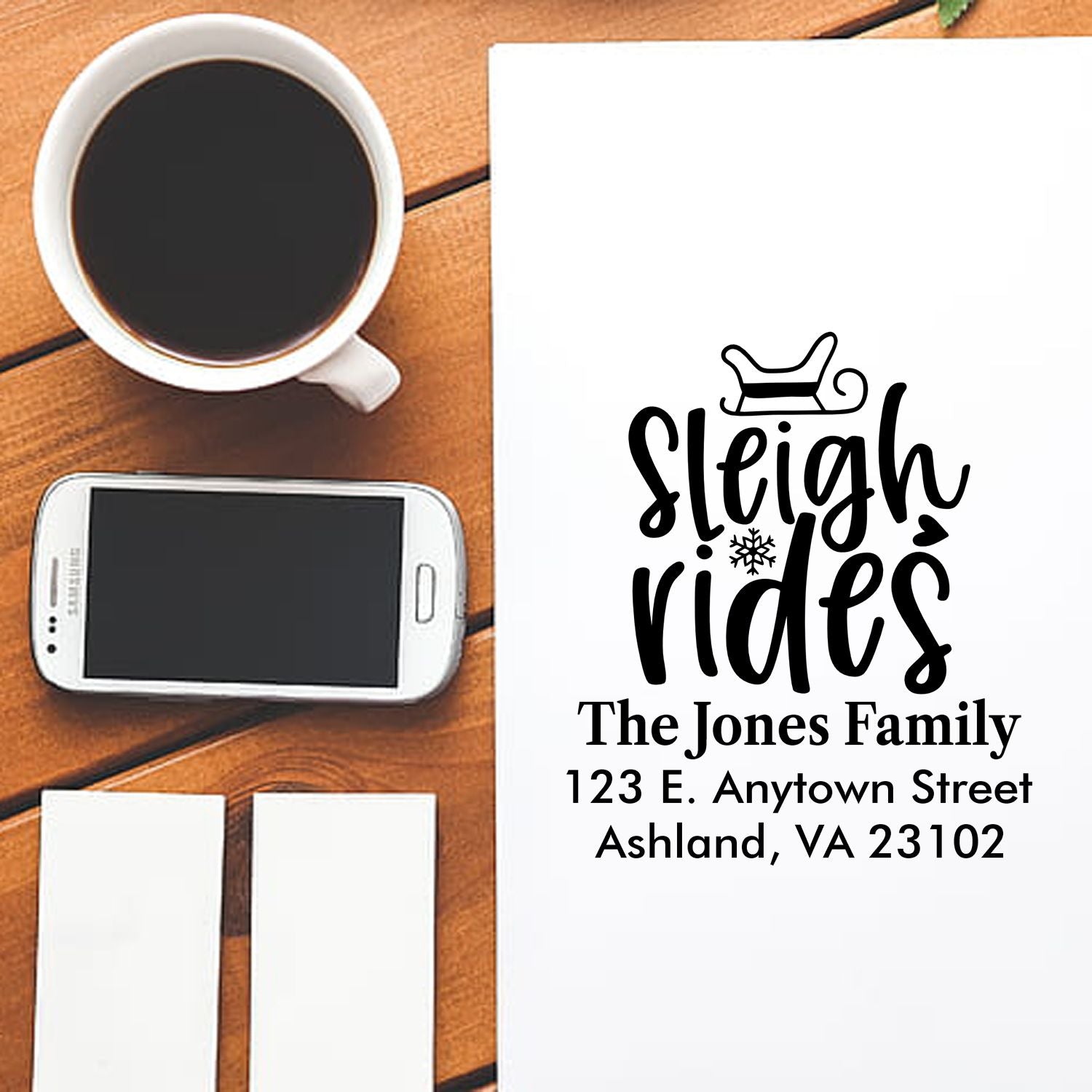 Personalized rubber stamp design with Sleigh Rides holiday return address for The Jones Family.