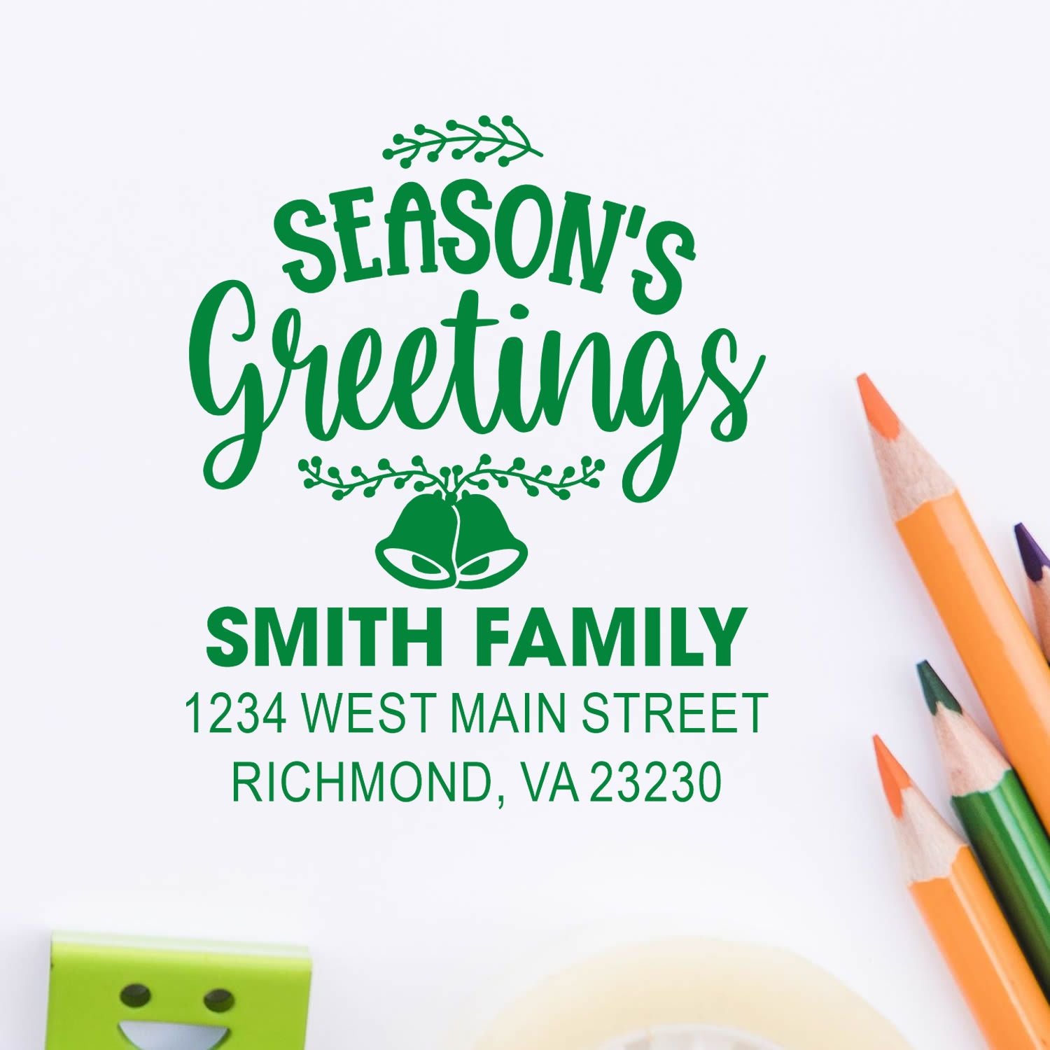 Custom holiday rubber stamp with Seasons Greetings, Smith Family name, and return address for festive cards and mailings