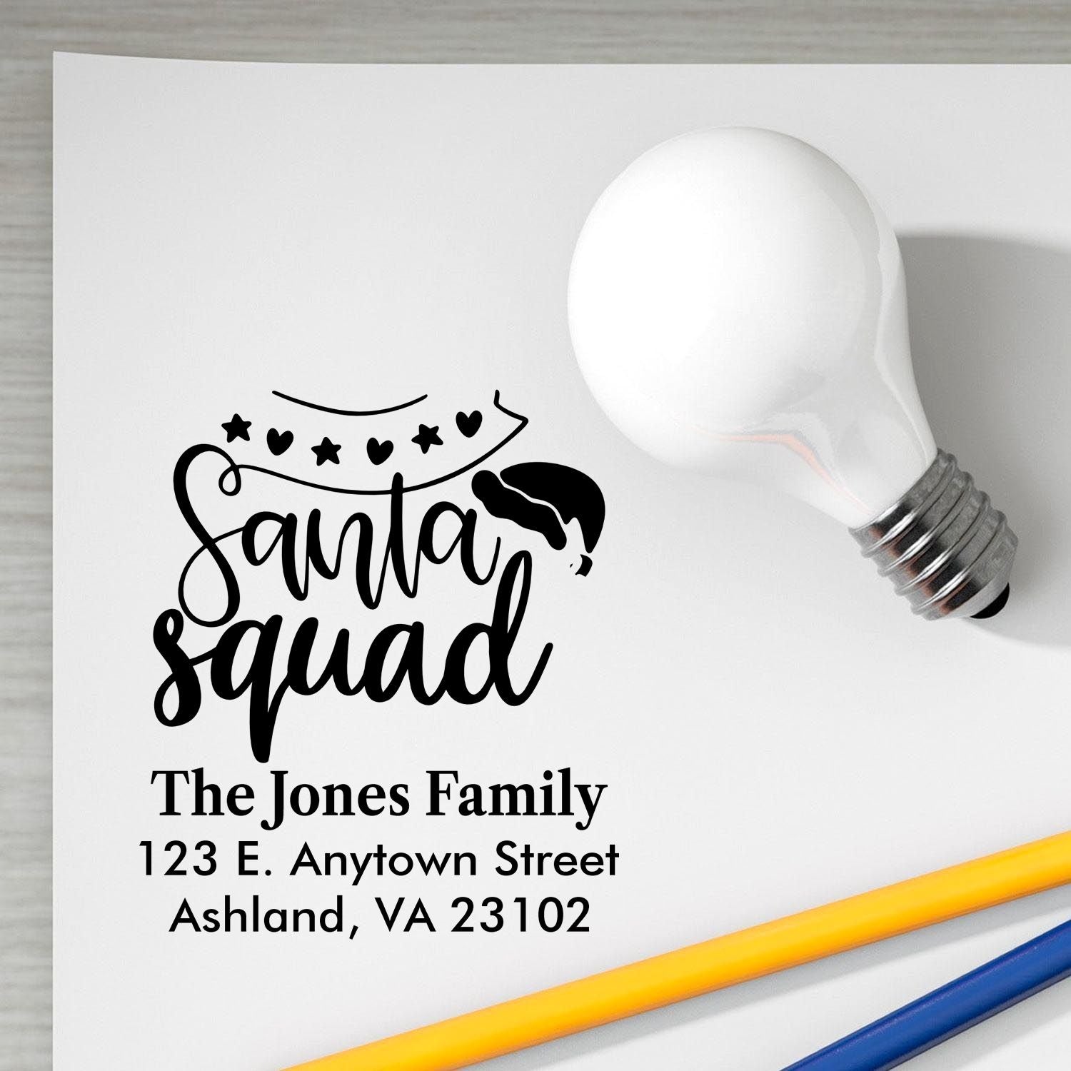 Custom Santa Squad rubber stamp with family name and address for personalized Christmas cards and holiday mailings.