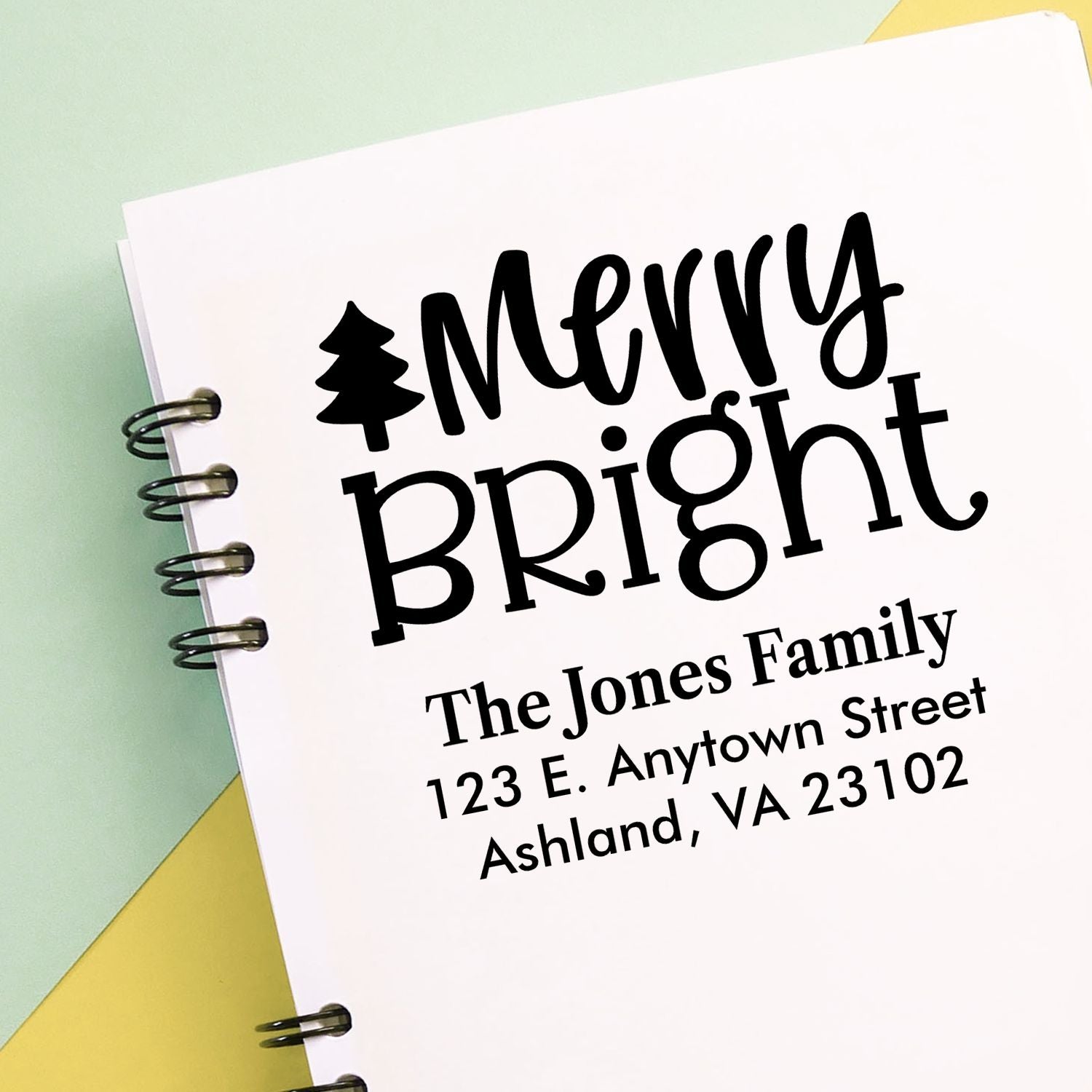 Custom Merry Bright holiday address rubber stamp for Christmas cards with family name and address.