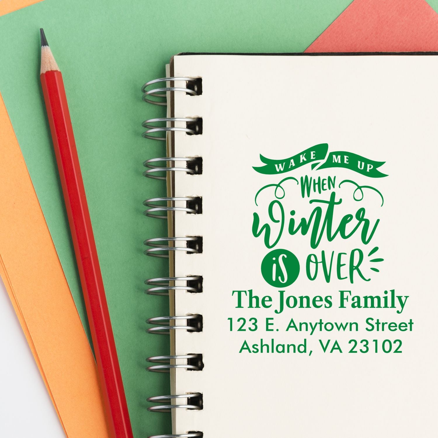 Personalized rubber stamp mockup with winter greeting and return address for The Jones Family