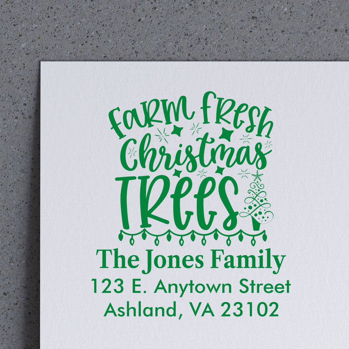 Custom Christmas tree rubber stamp with Farm Fresh Christmas Trees, The Jones Family, and return address in Ashland, VA.