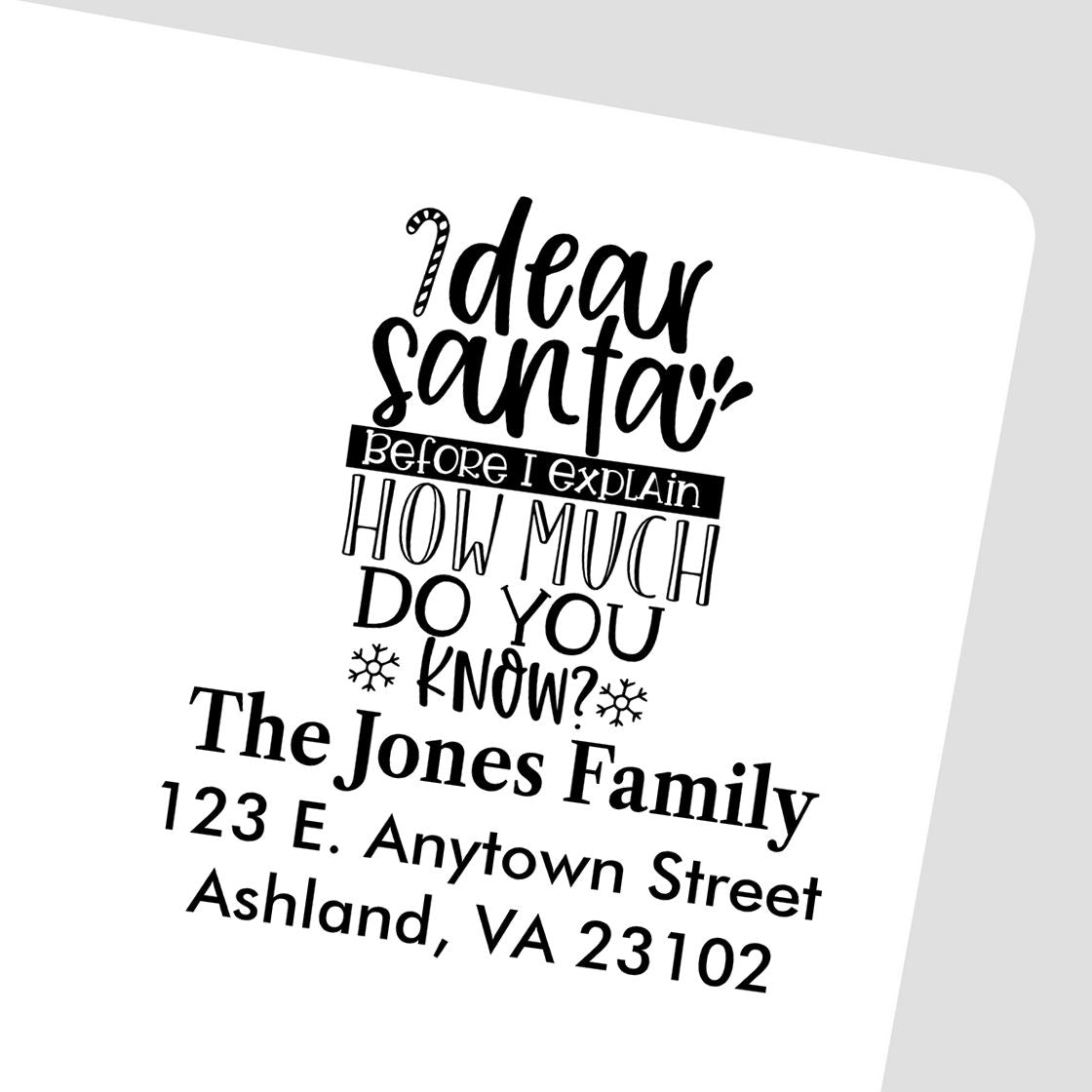 Personalized Christmas address rubber stamp with Dear Santa message, family name, and mailing address for holiday cards.