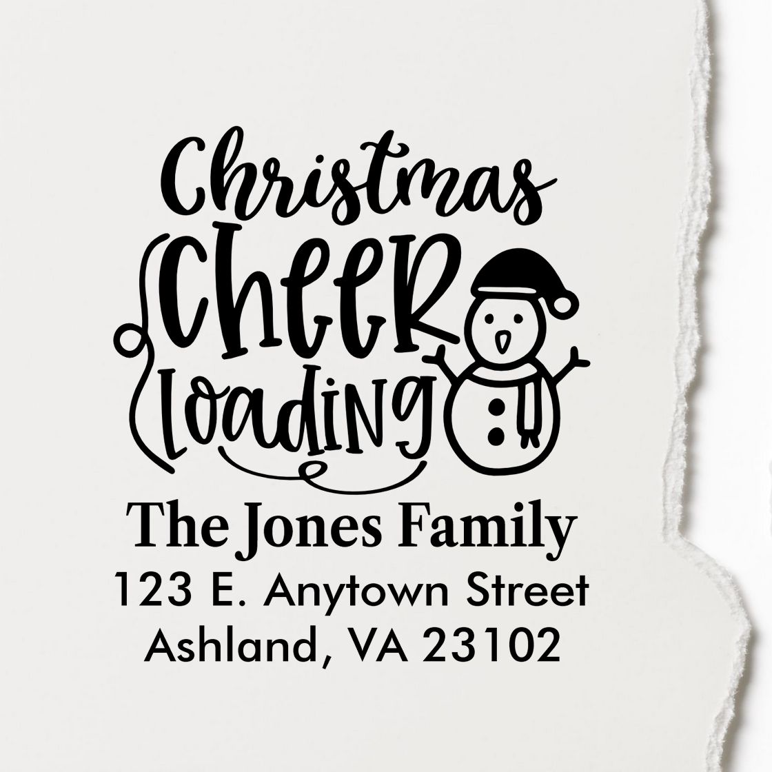 Custom Christmas rubber stamp with snowman, Christmas Cheer Loading, and personalized family name and address.