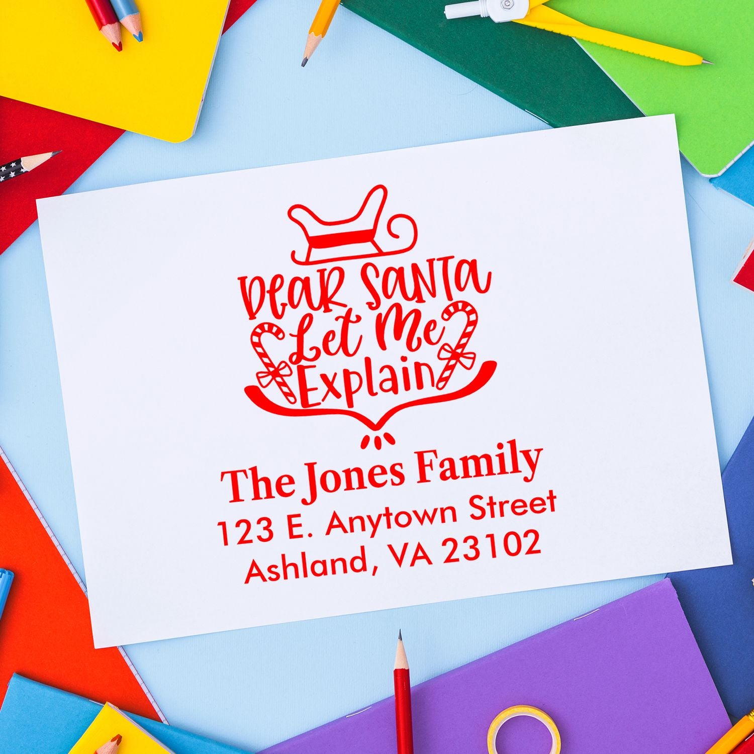 Custom Christmas rubber stamp with Dear Santa Let Me Explain and family return address for holiday cards and mail.