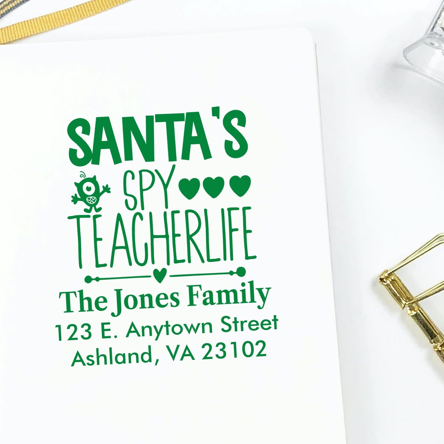 Custom Santas Spy TeacherLife rubber stamp with family address, a fun Christmas teacher gift for holiday cards and packages.