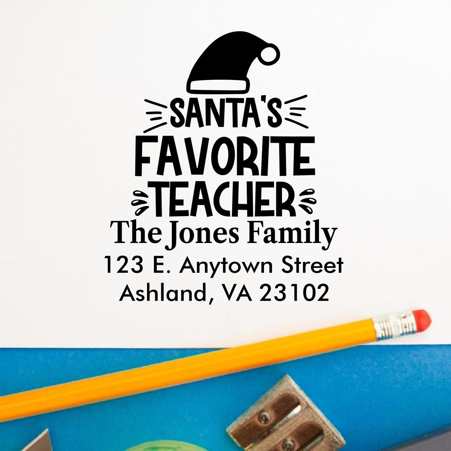 Custom Santas Favorite Teacher rubber stamp design with family name and address for holiday teacher appreciation gifts.
