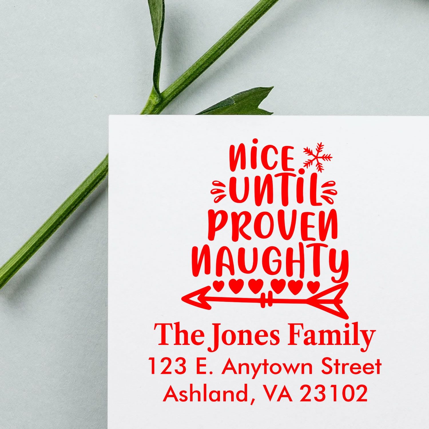Personalized Christmas return address rubber stamp with Nice Until Proven Naughty design for The Jones Family, Ashland, VA.