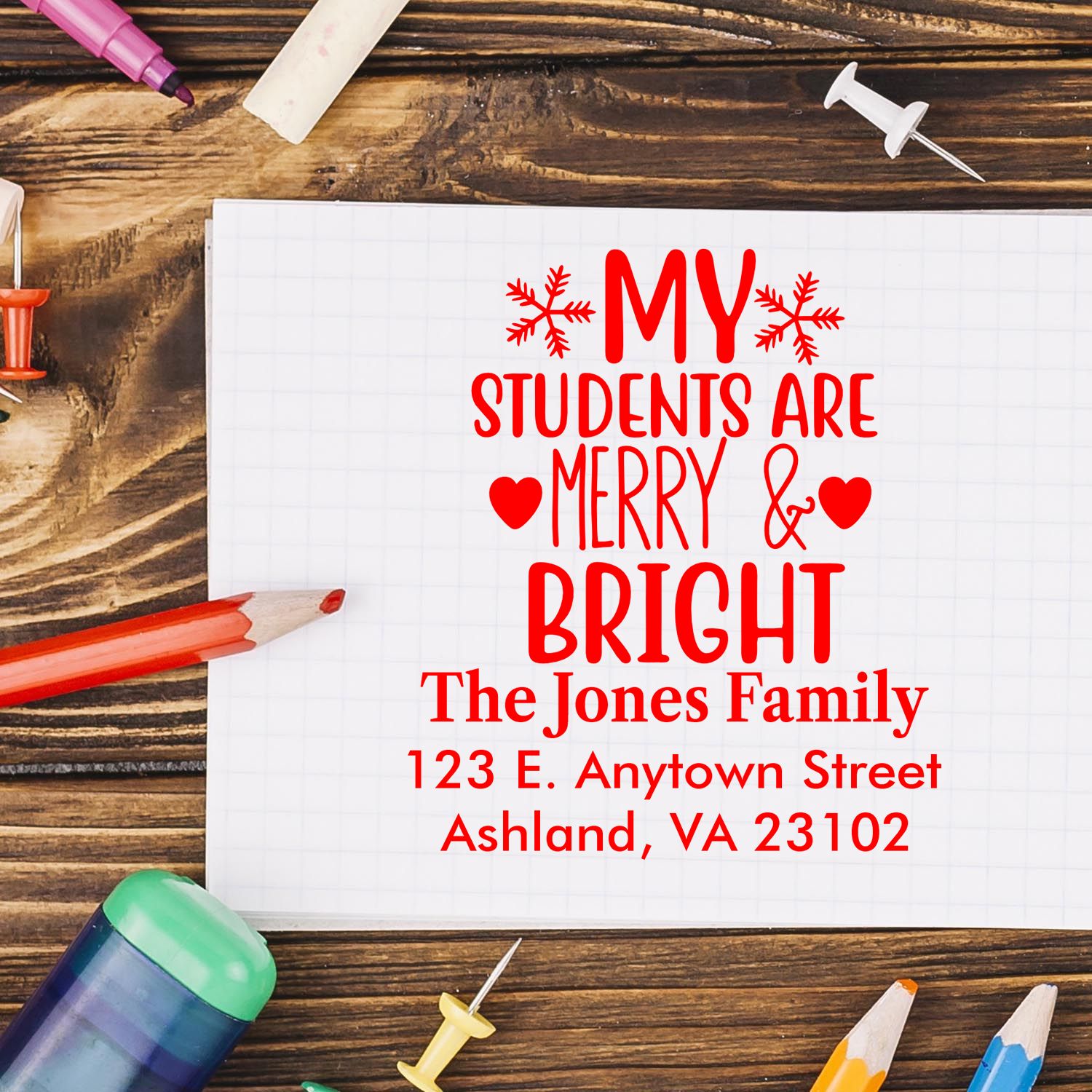 Personalized holiday address rubber stamp reading My Students Are Merry & Bright with family name and mailing address.