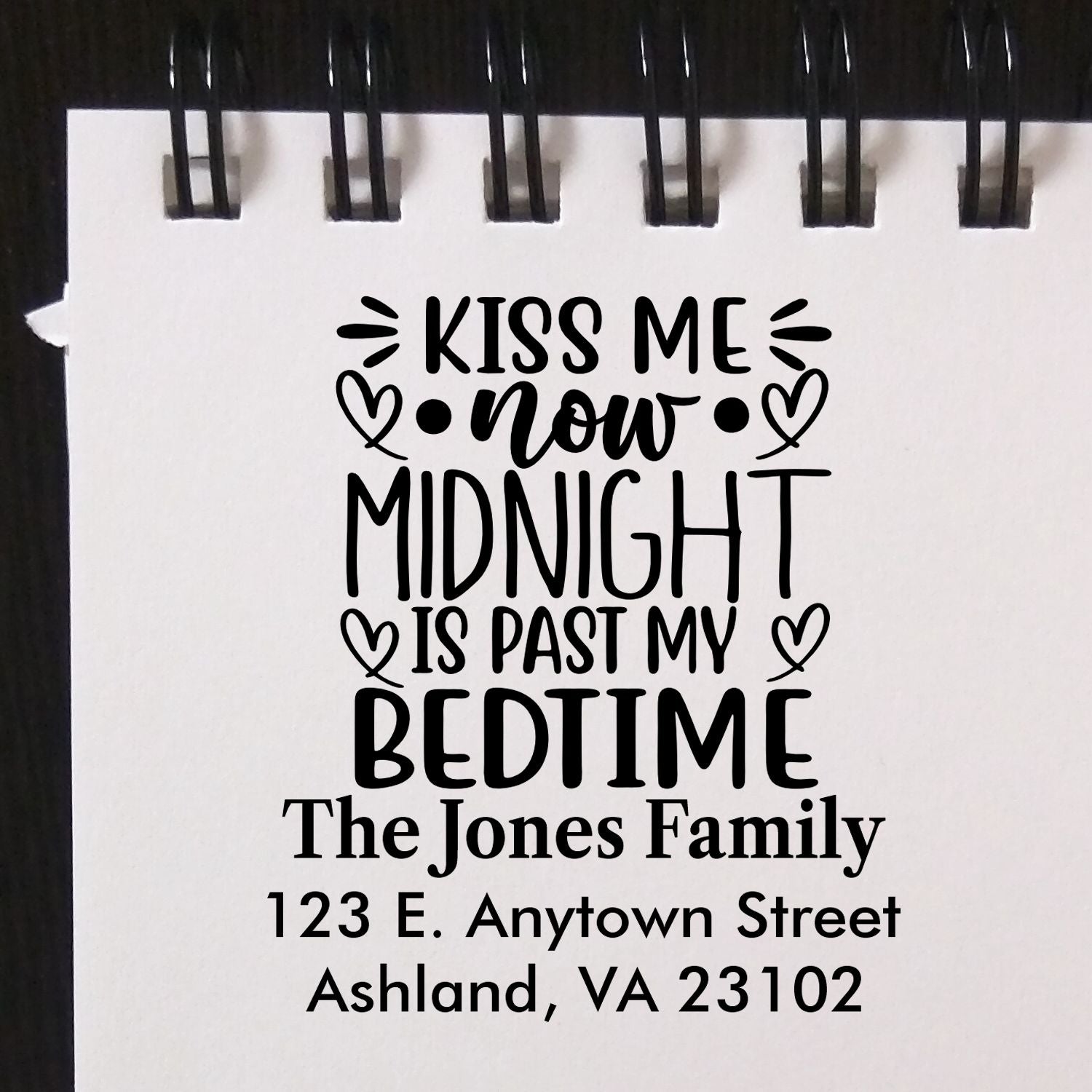 Personalized rubber stamp design with Kiss Me Now, Midnight Is Past My Bedtime and The Jones Family address details.