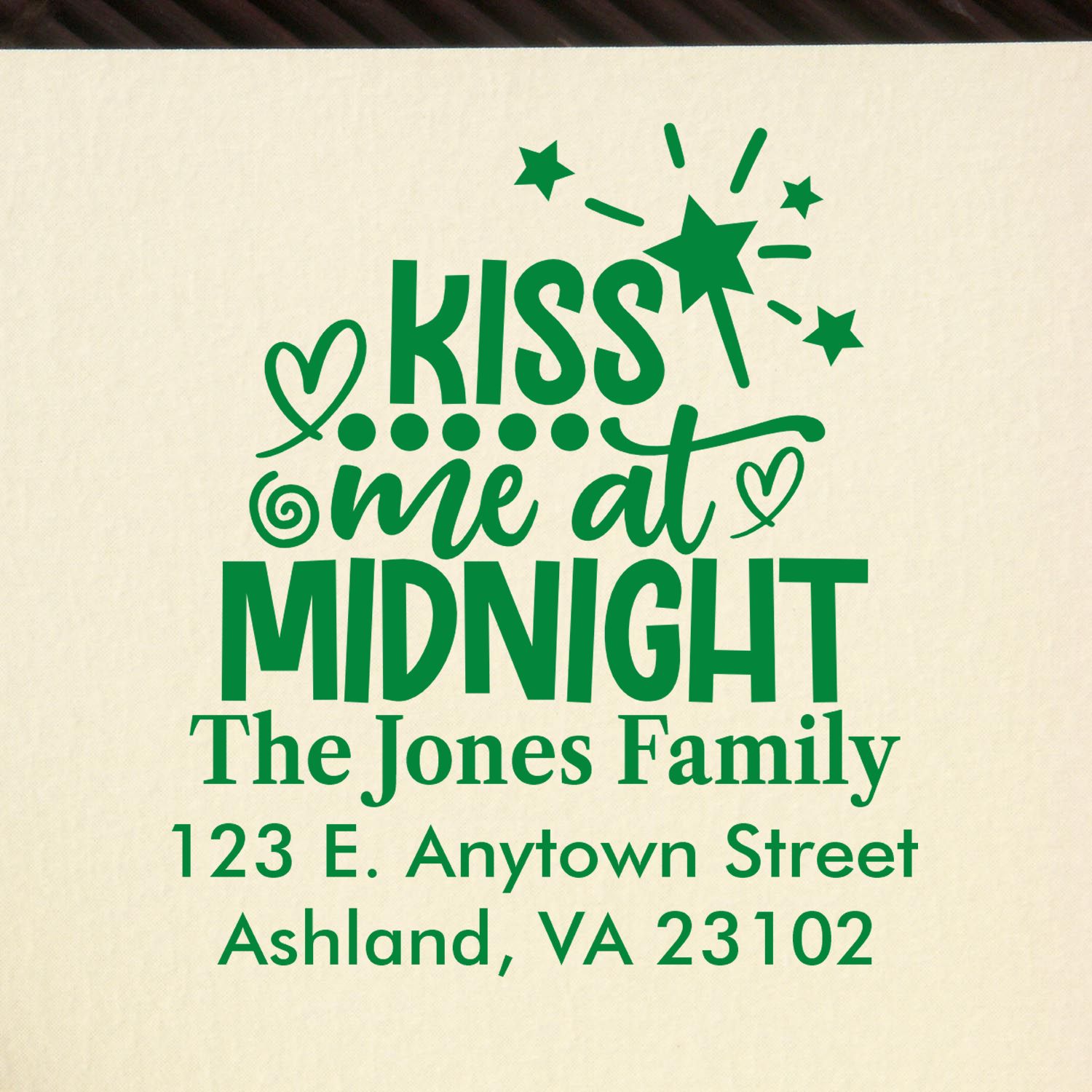 Custom rubber address stamp with Kiss Me at Midnight, The Jones Family name, and Ashland, VA 23102 return address.