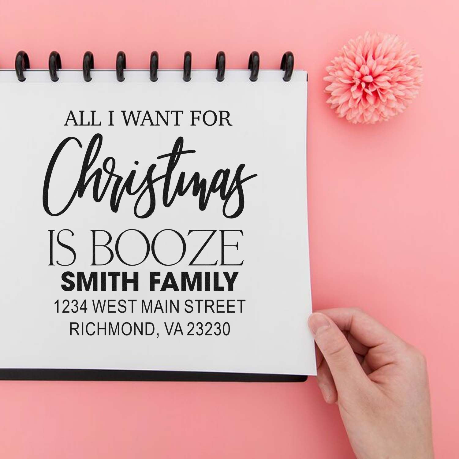 Custom Christmas address rubber stamp design with humorous All I Want for Christmas Is Booze family name and return address.