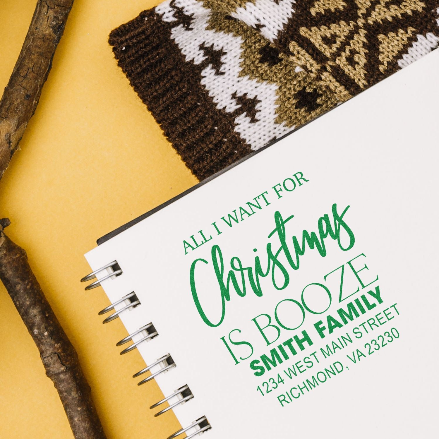 Personalized Christmas rubber stamp design with festive message and family address for holiday cards, gifts, and packaging.