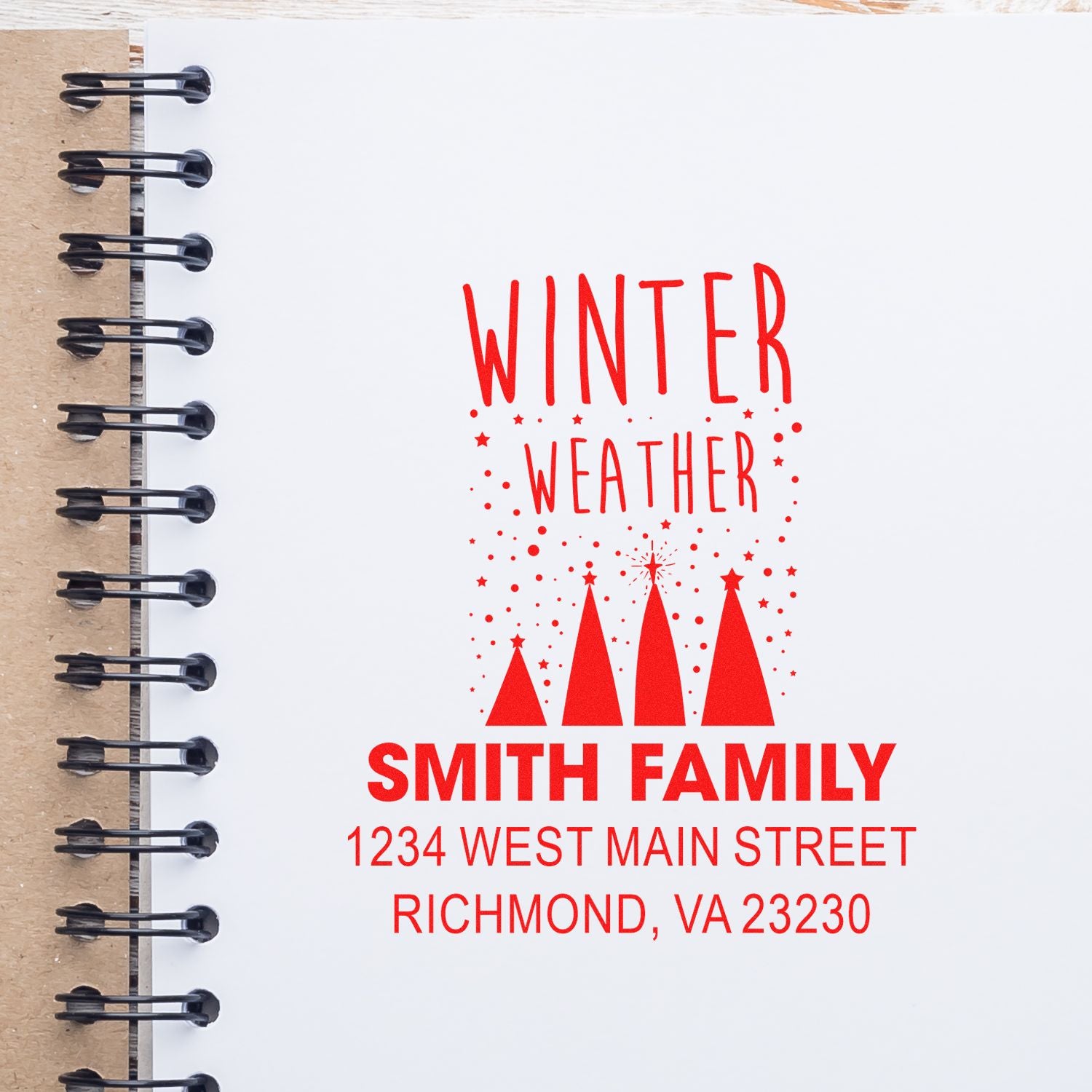 Custom winter weather rubber stamp with family name and address for seasonal cards, holiday mail, and packaging.