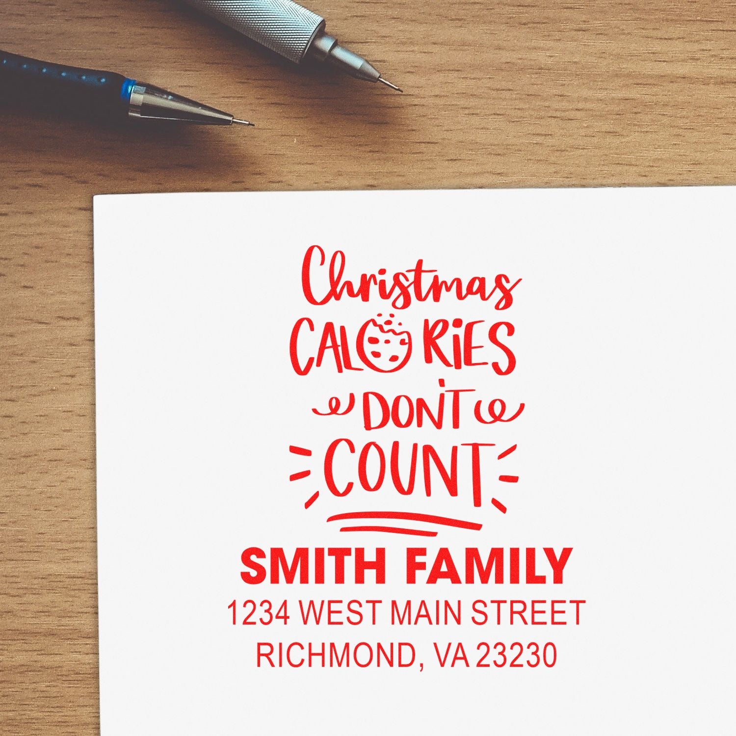 Custom Christmas rubber stamp design with Christmas Calories Dont Count, Smith Family name, and return address.