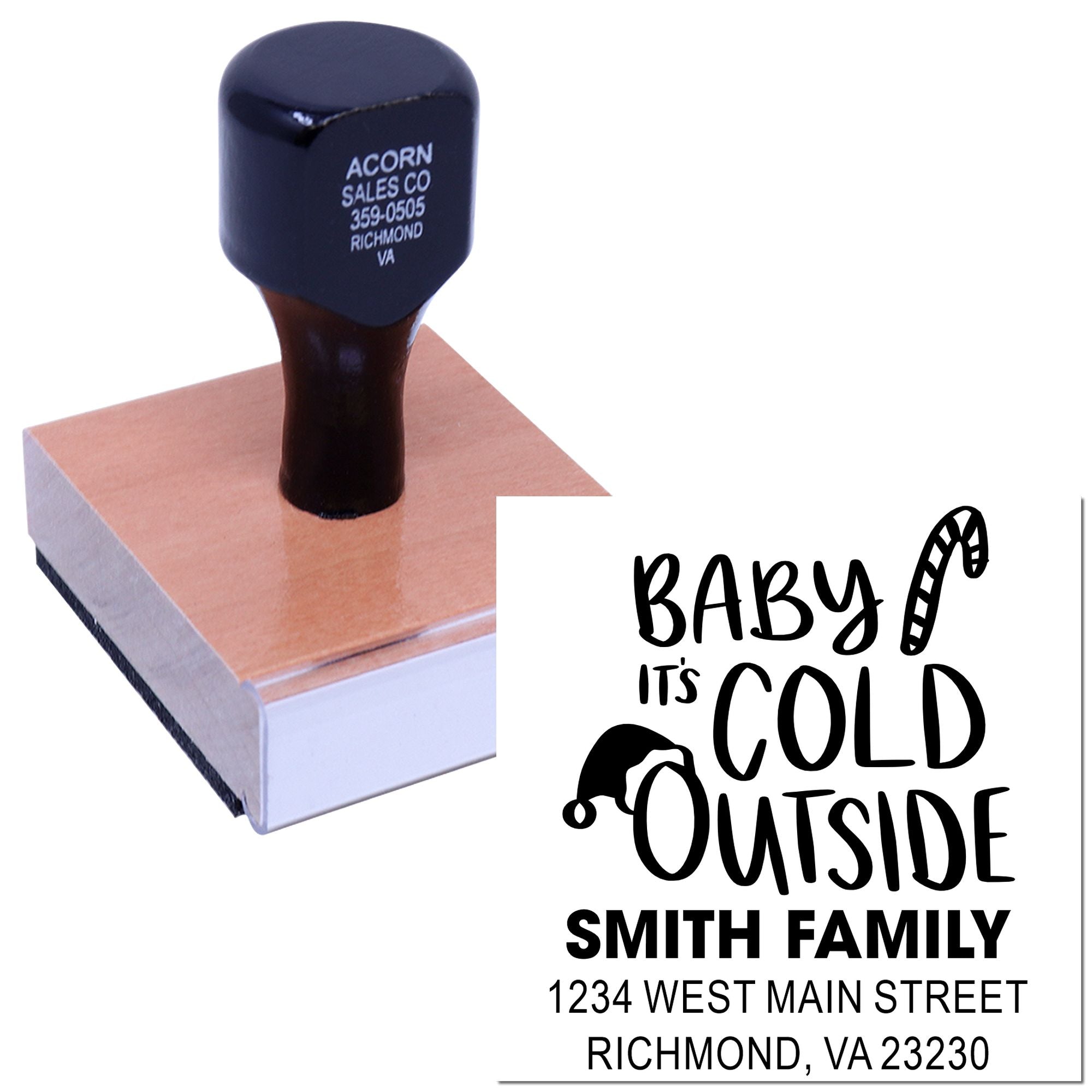 Custom rubber stamp on wooden block showing a Baby Its Cold Outside Smith Family holiday address design.
