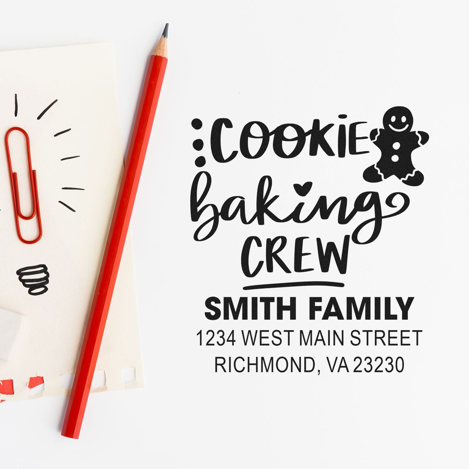 Custom rubber stamp for cookie baking crew with family name and address for personalized baking packaging and mailings.