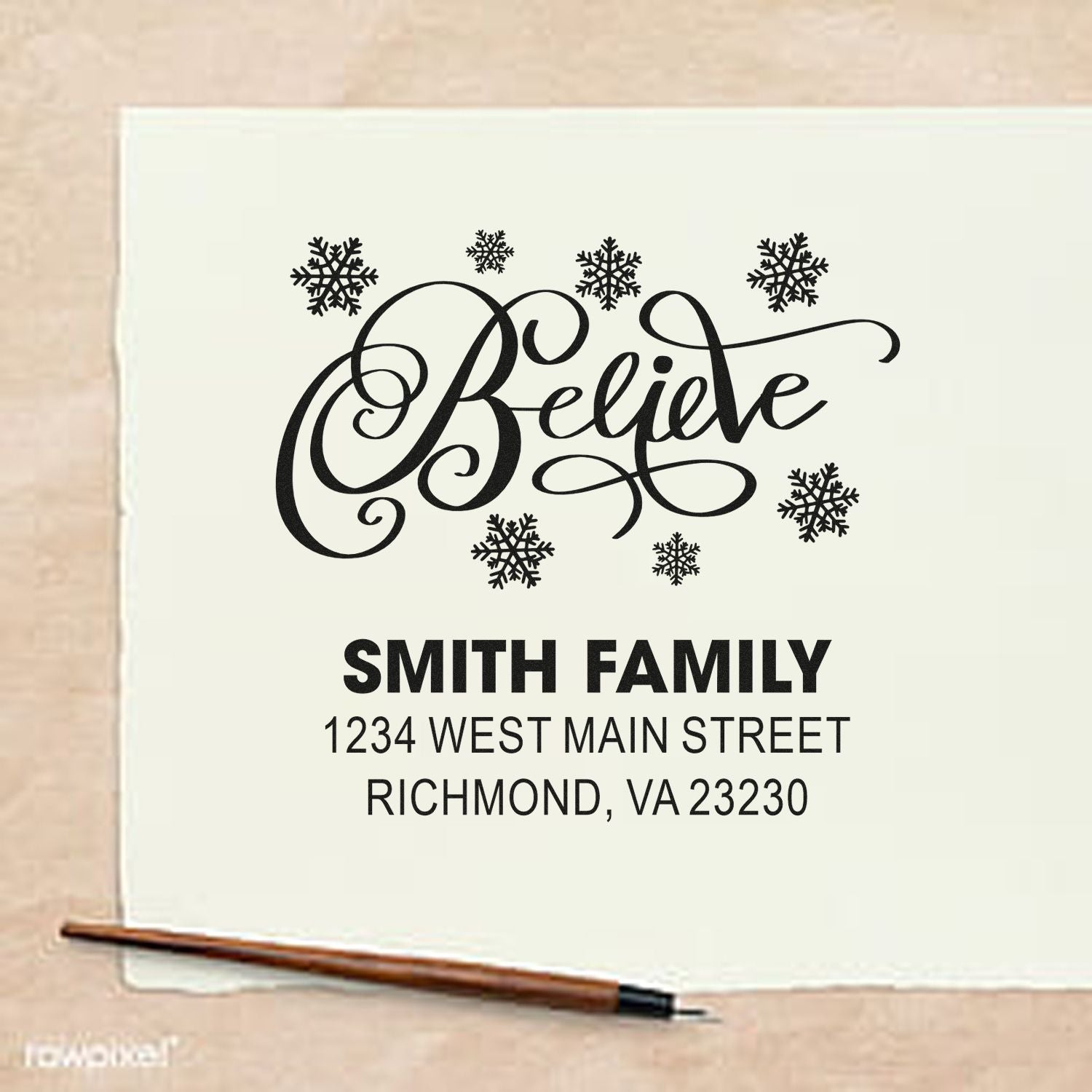 Custom holiday return address rubber stamp with Believe, snowflakes, and Smith Family details for Christmas cards.