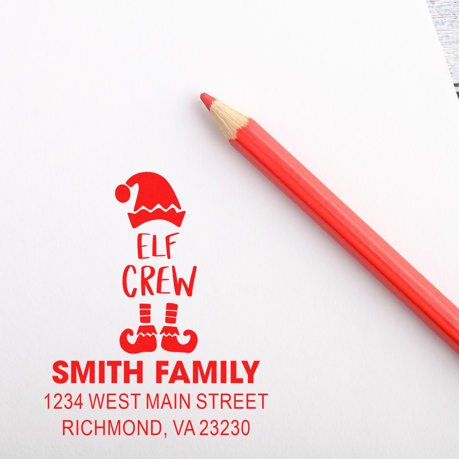 Personalized Elf Crew Christmas return address rubber stamp for the Smith family with festive Santa hat and address.
