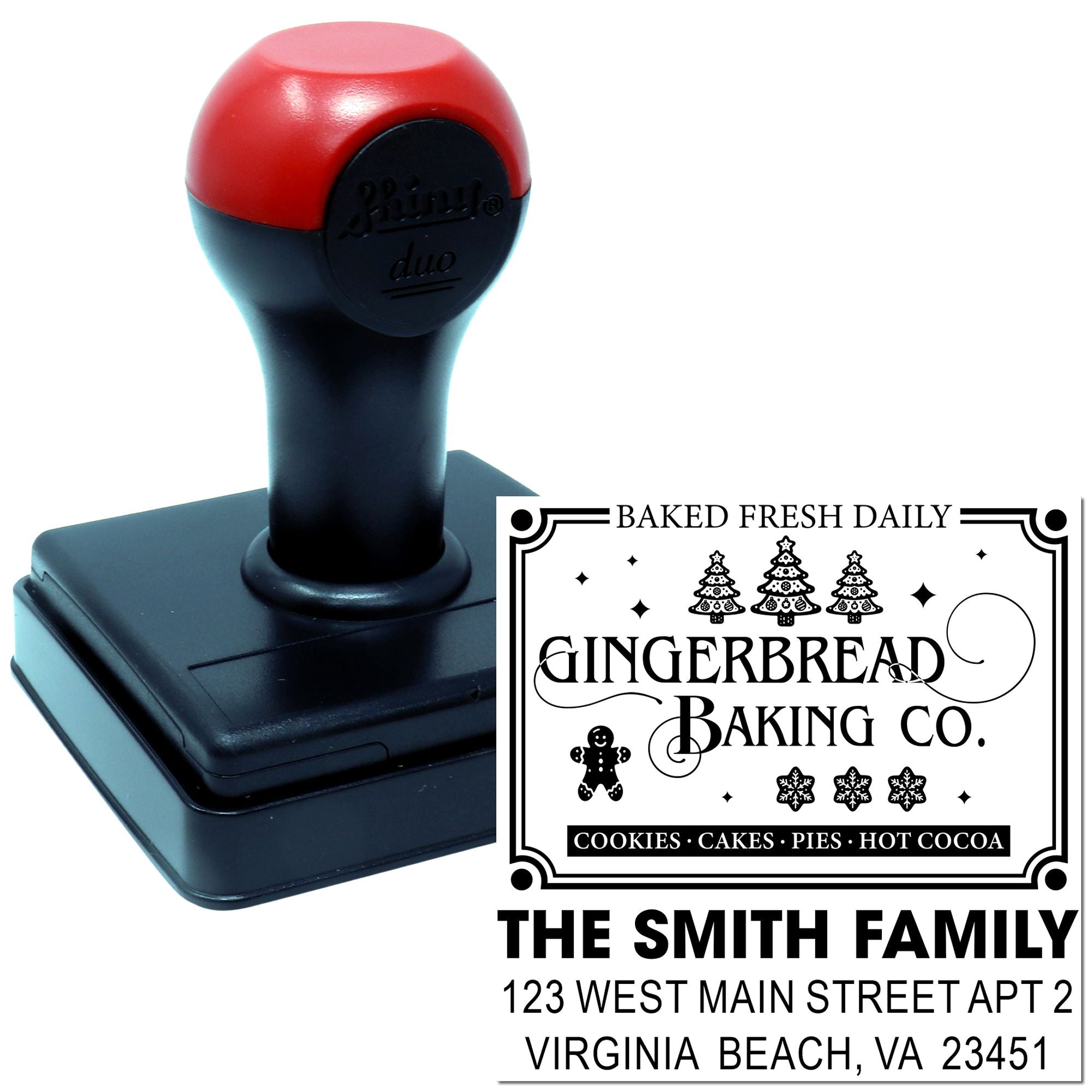 Custom self-inking rubber stamp for bakery branding and address use, with Gingerbread Baking Co. family design.